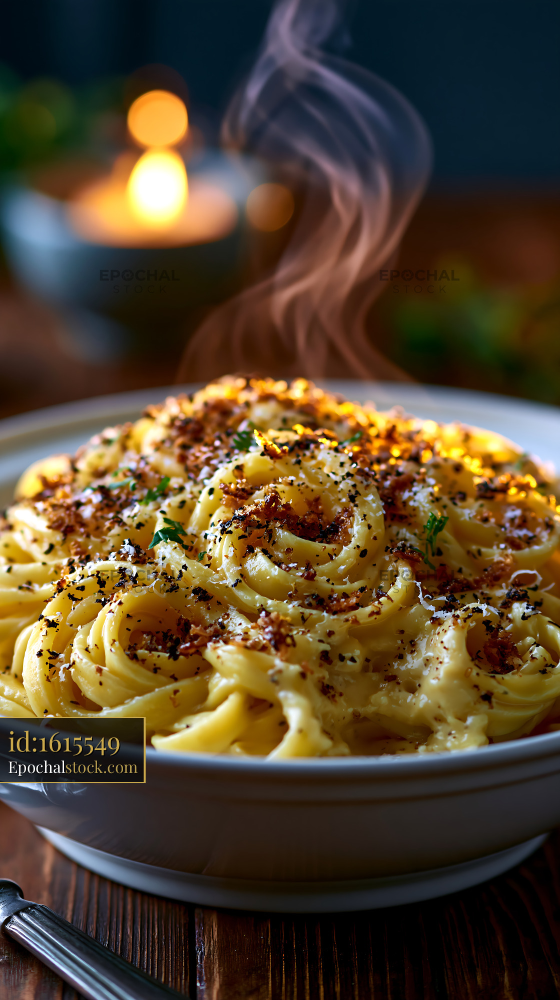 Watermarked full-resolution preview of Pasta served in a bowl with steam rising in a dimly lit setting