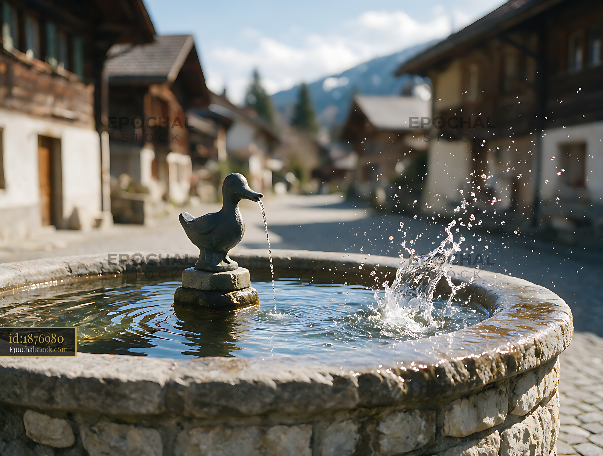 Watermarked full-resolution preview of Stone duck fountain in an alpine village