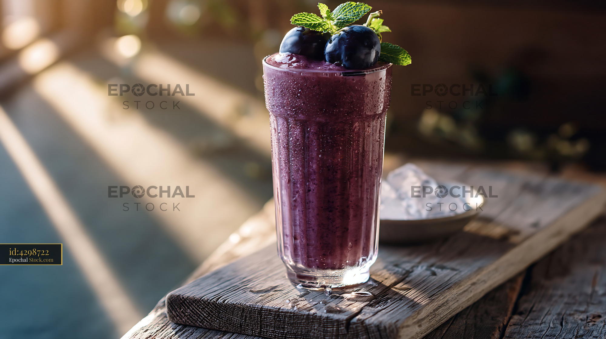 Fresh kyoho grape smoothie with mint on rustic wooden board - stock photo