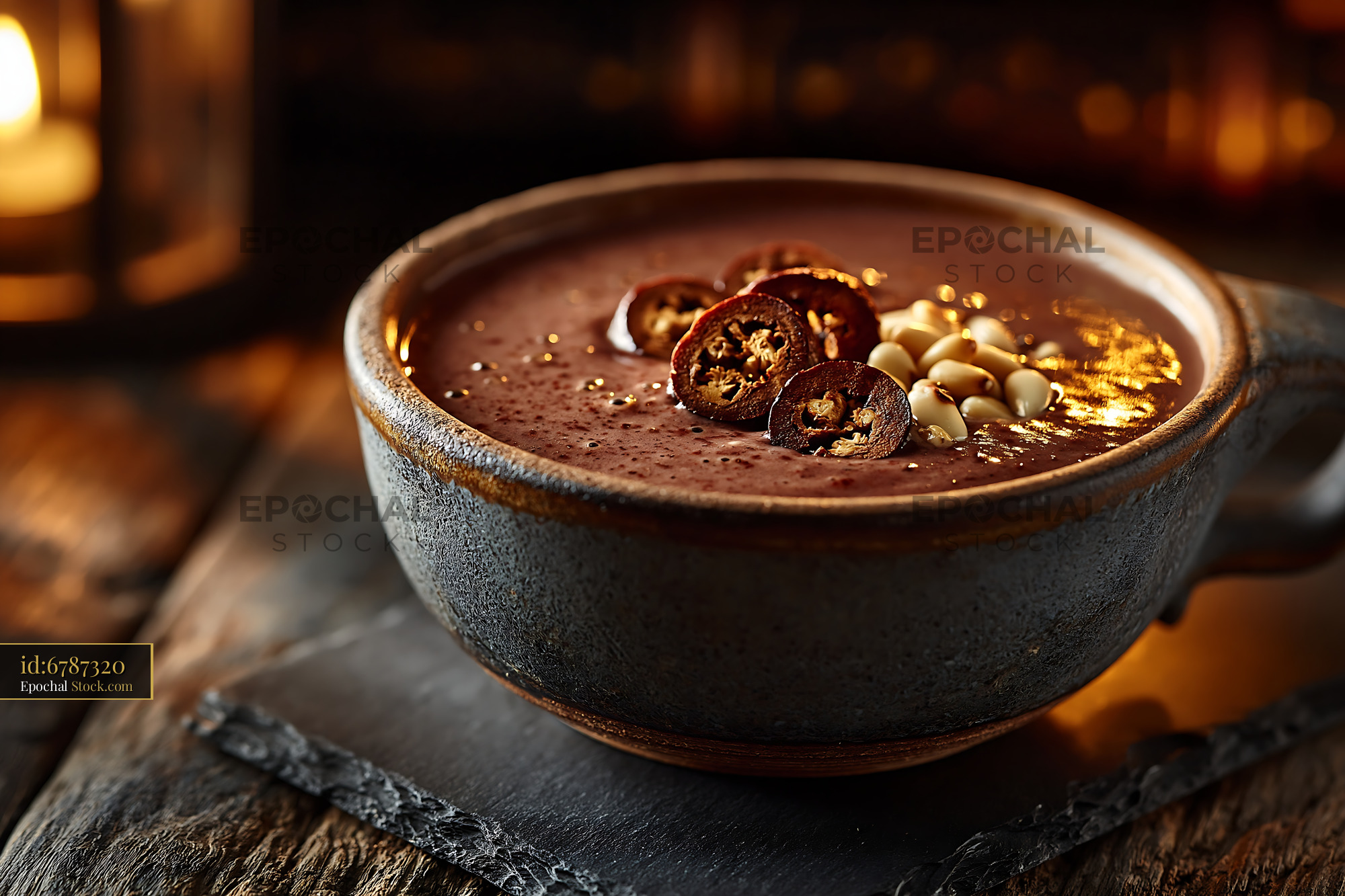 Daechu jujube smoothie with pine nuts in a rustic ceramic mug - stock photo
