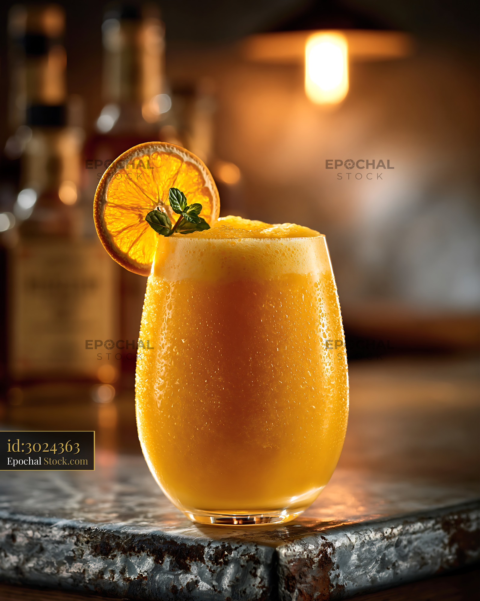 Refreshing hallabong citrus smoothie garnished with orange and mint - stock photo