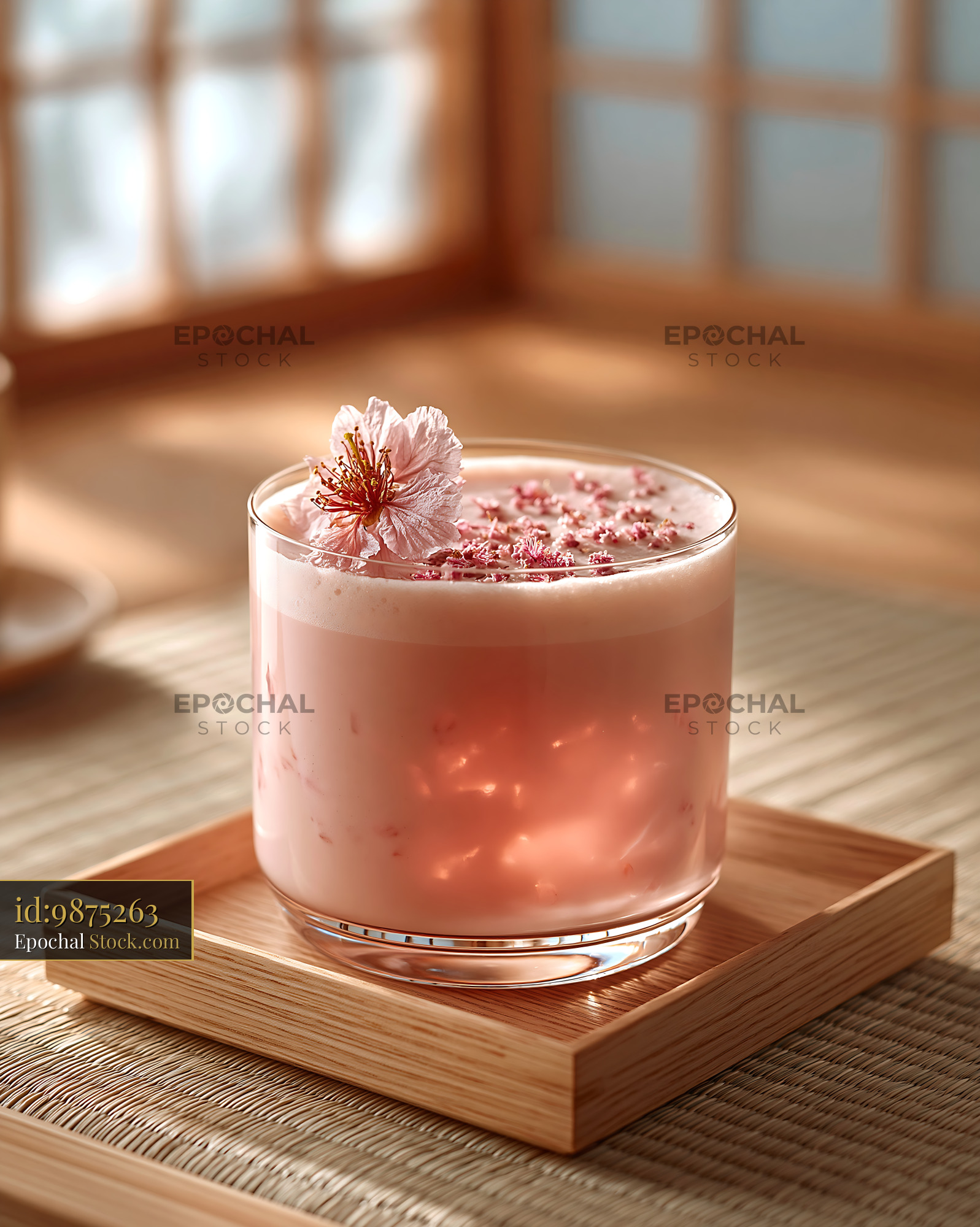 Pink sakura blossom smoothie garnished with cherry flower - stock photo