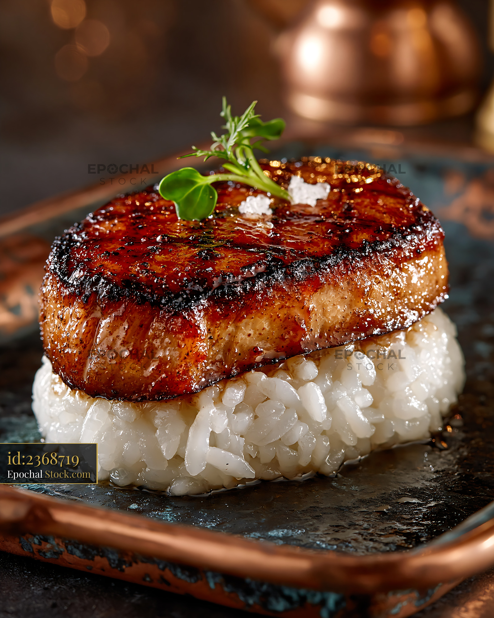 Seared foie gras nigiri sushi with microgreen garnish - stock photo