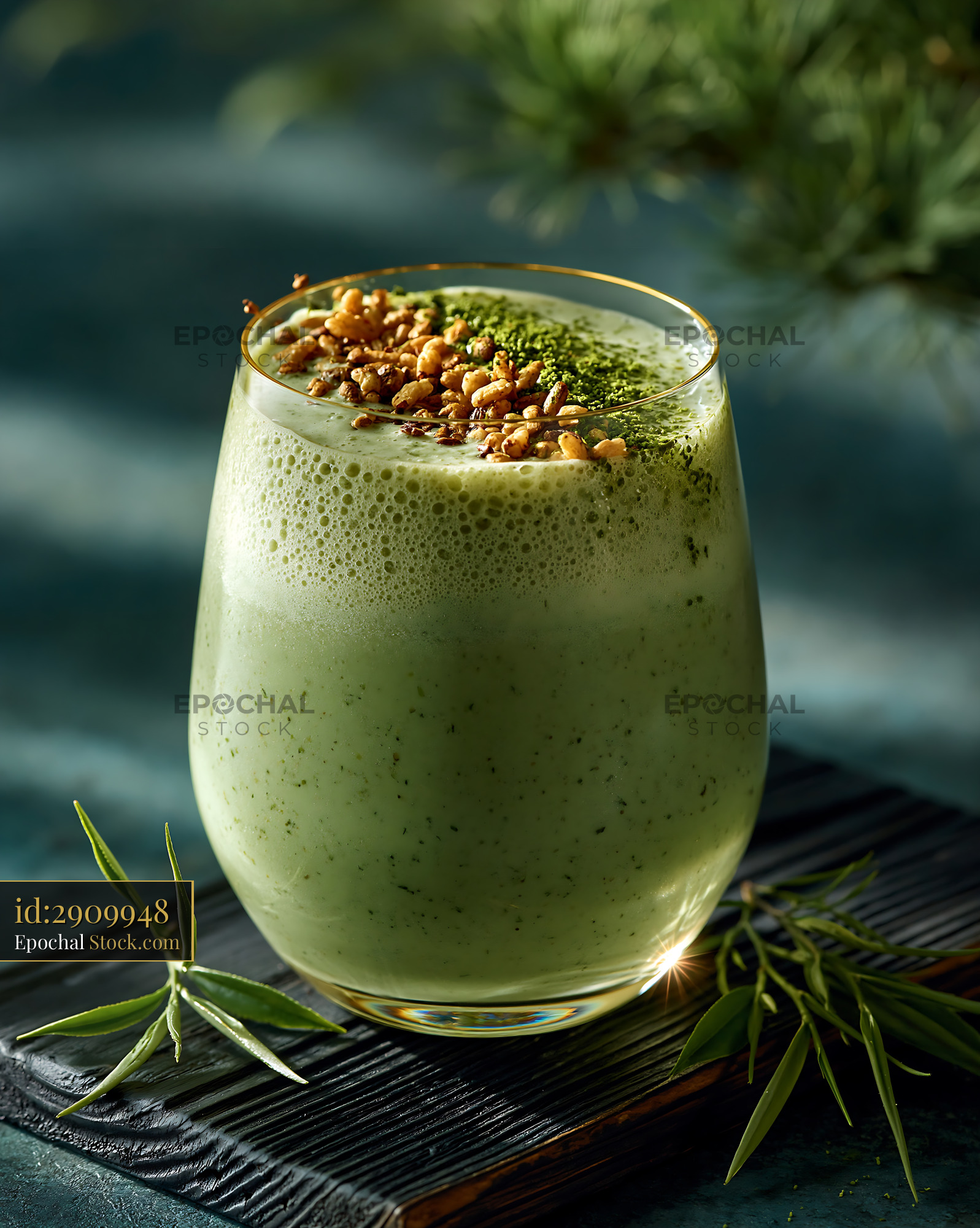 Genmaicha tea smoothie with roasted brown rice topping in a glass - stock photo