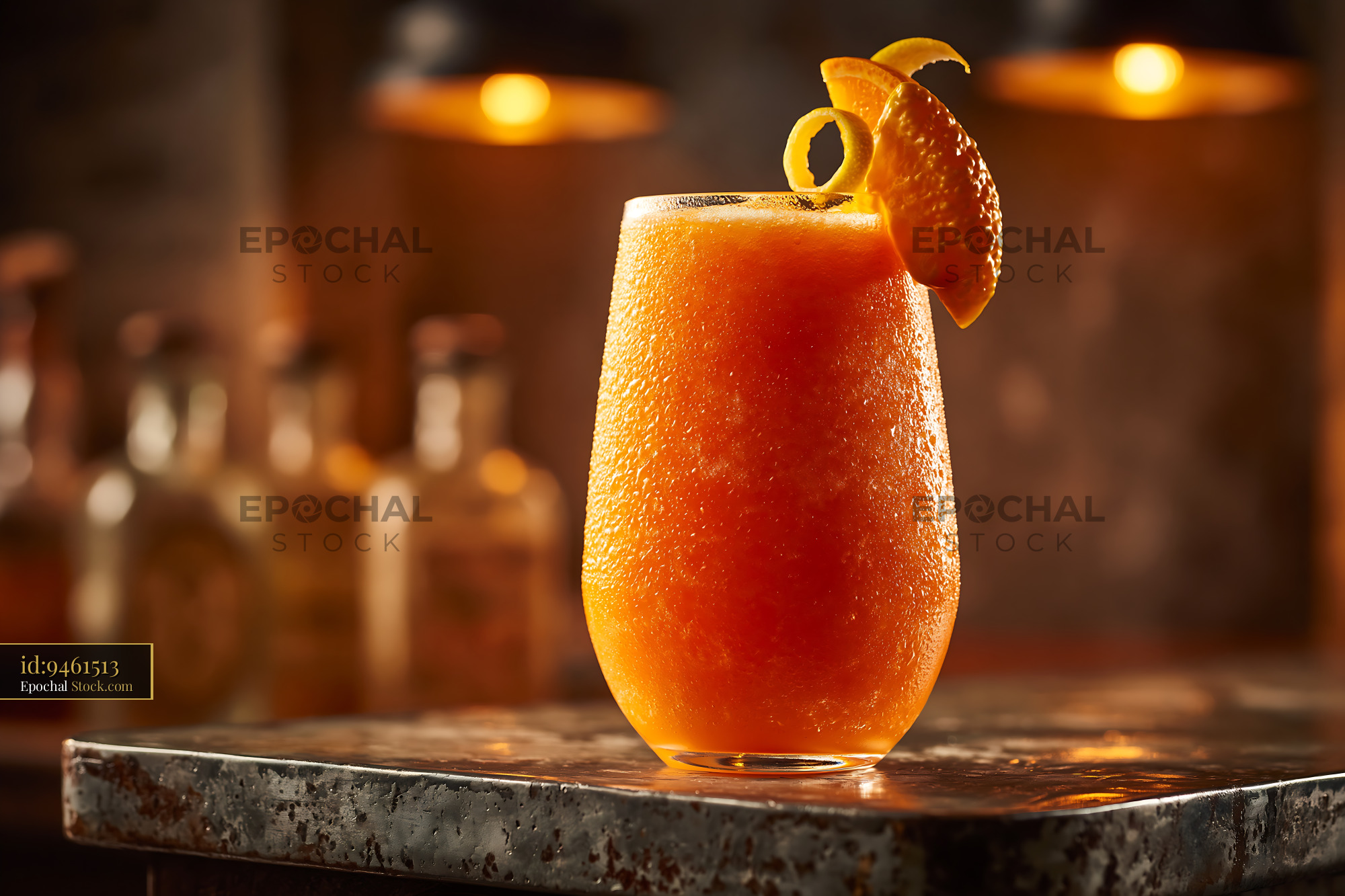 Hallabong citrus smoothie with orange garnish in a frosted glass - stock photo
