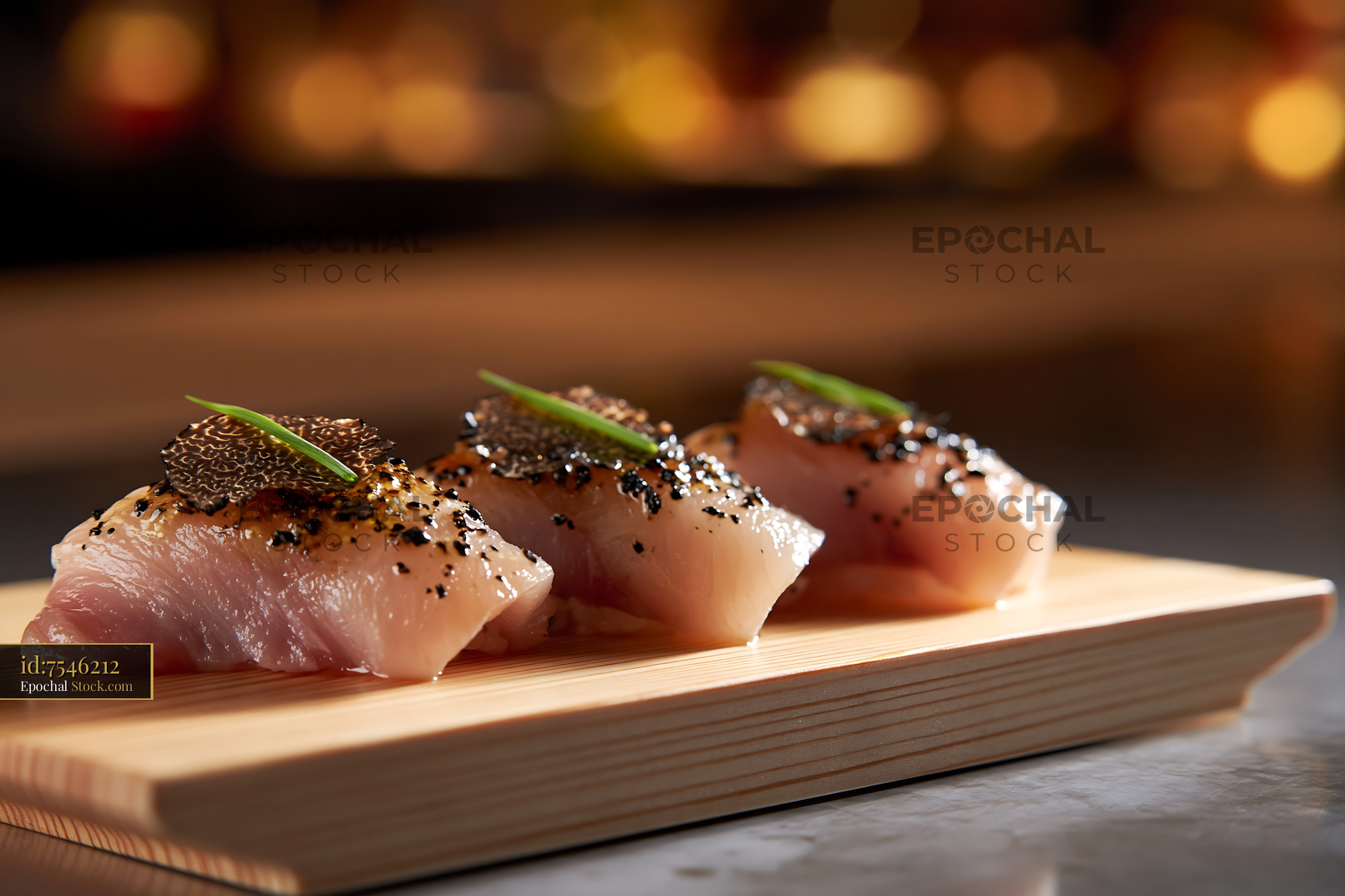 Truffle yellowtail sushi nigiri served on a wooden board - stock photo