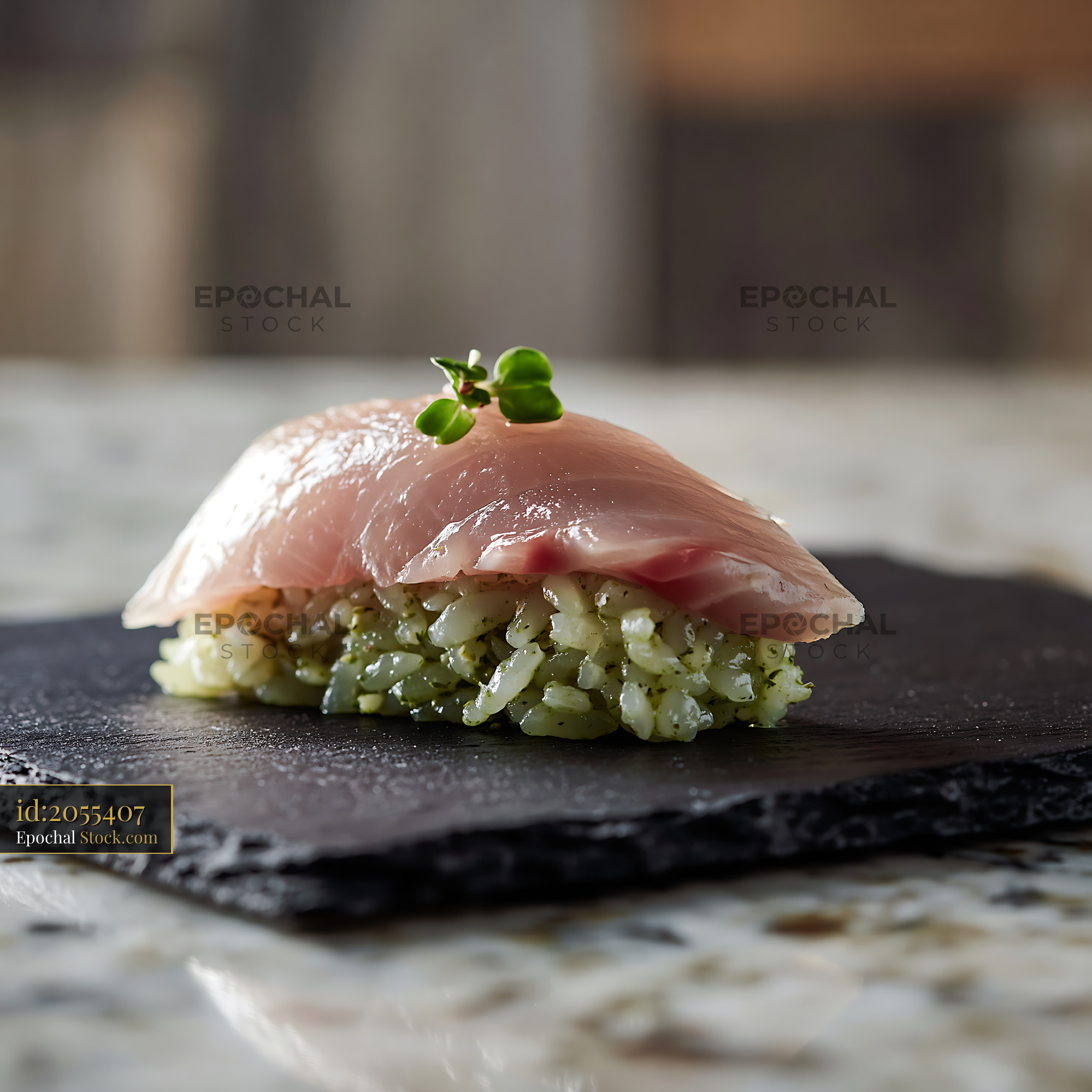Nigiri sushi with fresh raw fish on matcha infused rice - stock photo