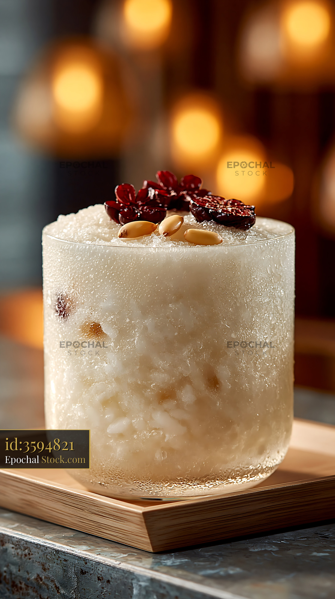 Traditional Korean sikhye rice smoothie topped with jujubes - stock photo