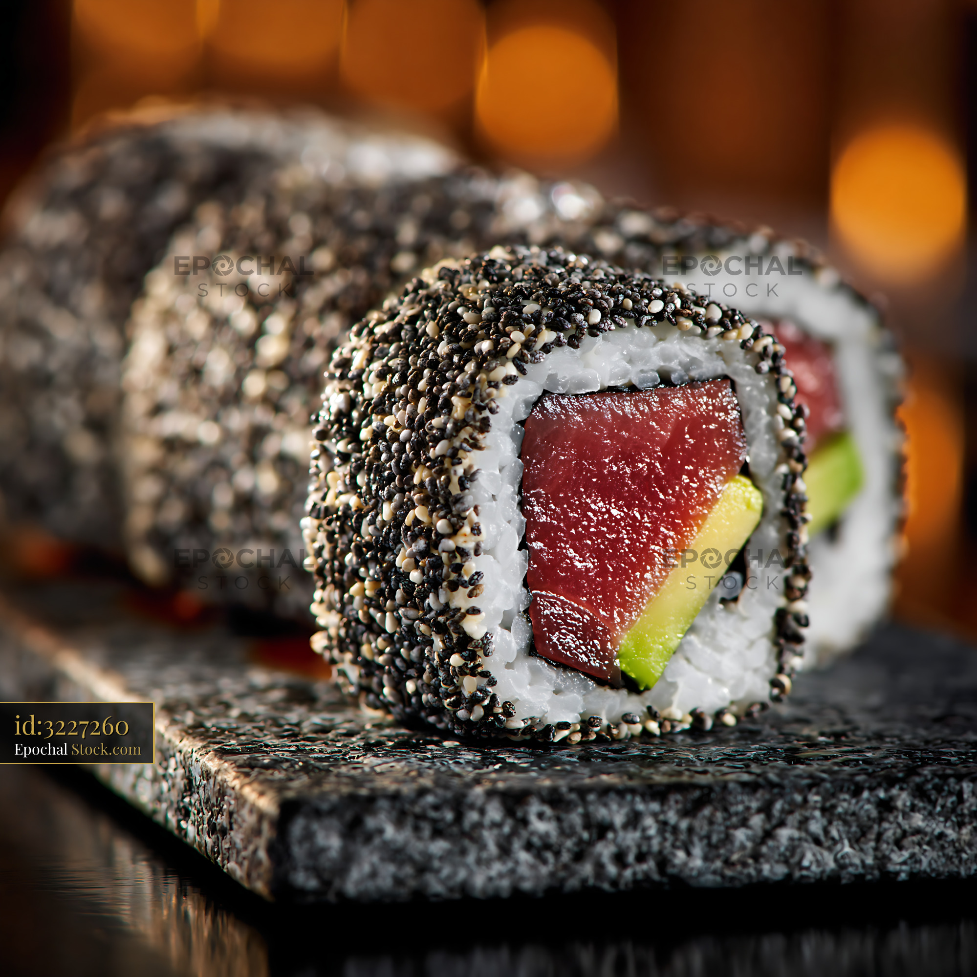 Chia seed crusted sushi rolls with tuna and avocado - stock photo
