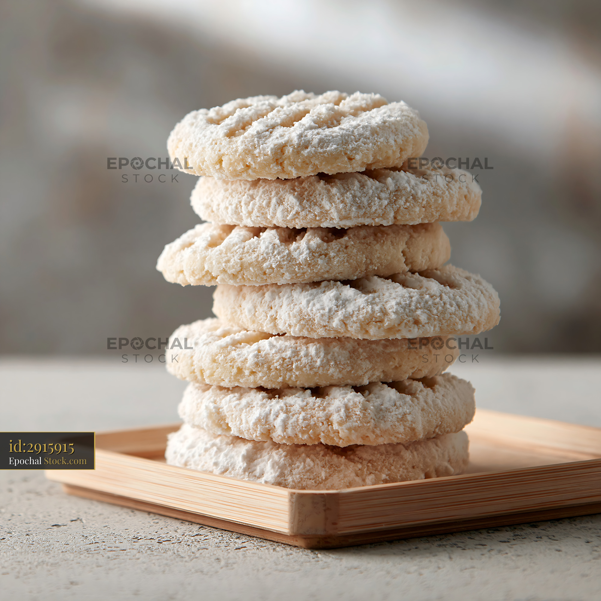 Traditional un kurabiyesi biscuits stacked on a small wooden tray - stock photo