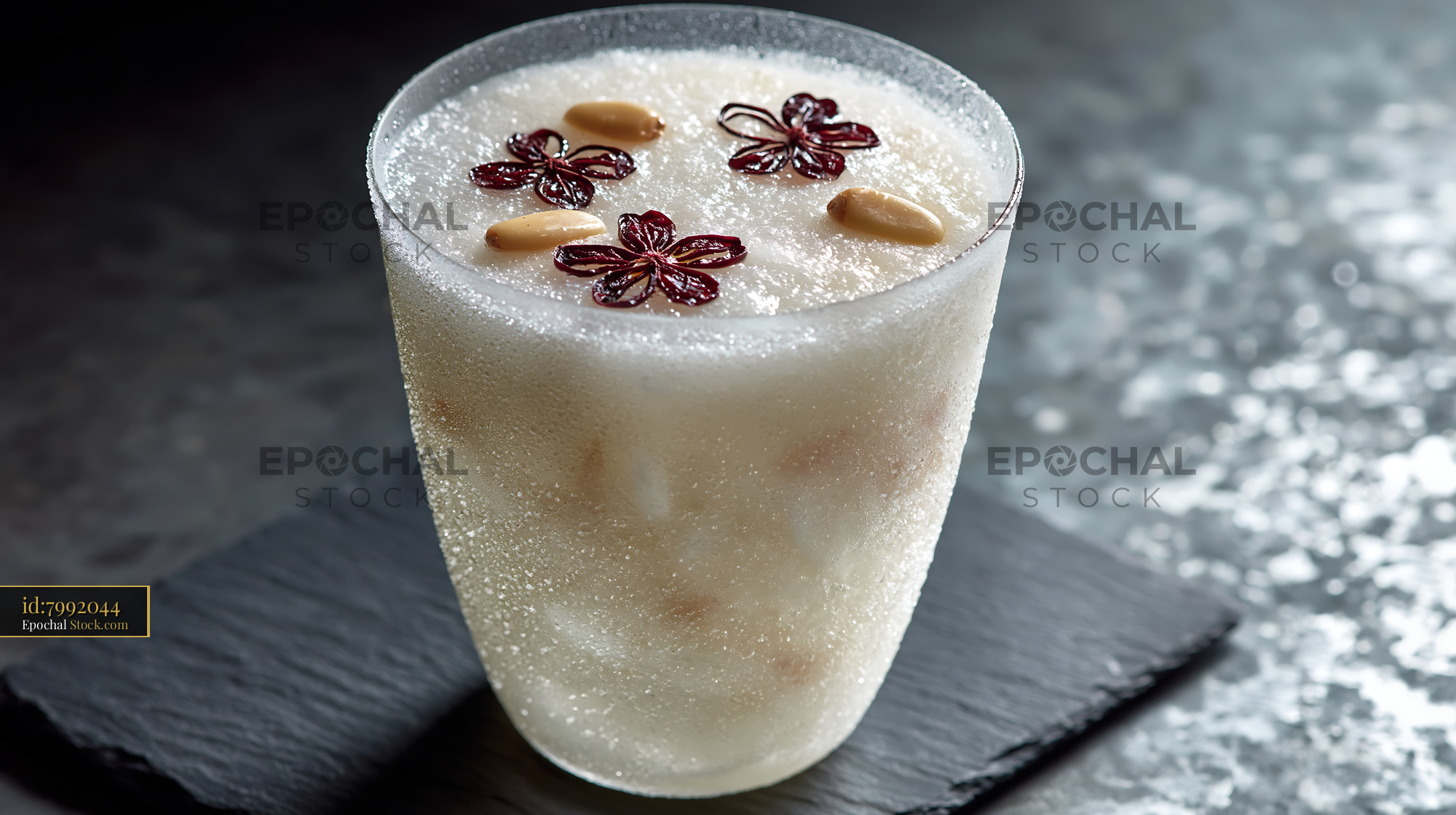 Sikhye rice smoothie with pine nuts and jujube flowers - stock photo