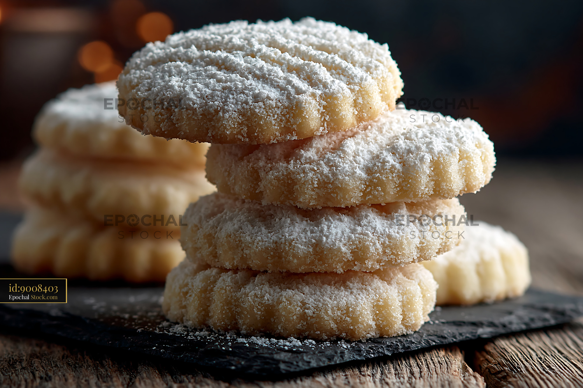Traditional un kurabiyesi biscuits with powdered sugar on rustic wood - stock photo