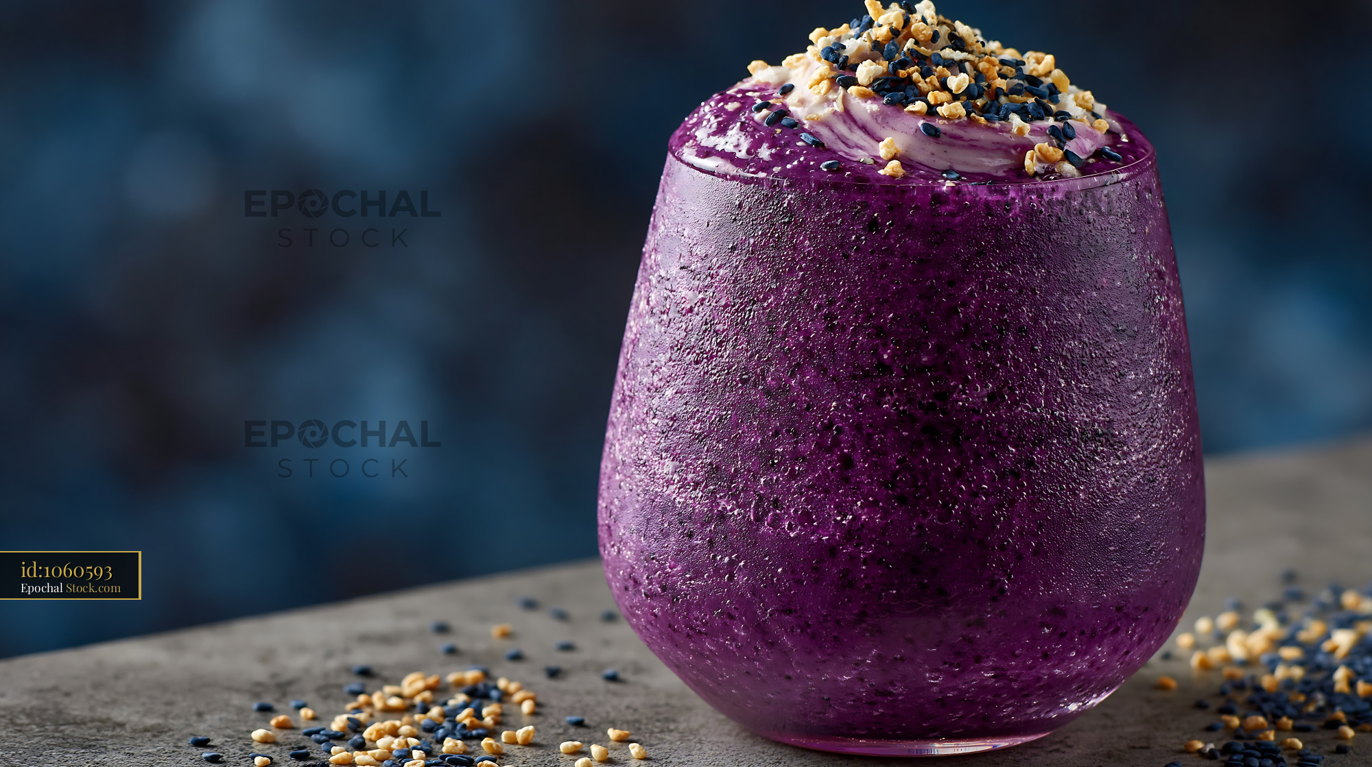 Vibrant purple beni imo smoothie topped with cream and toasted nuts - stock photo
