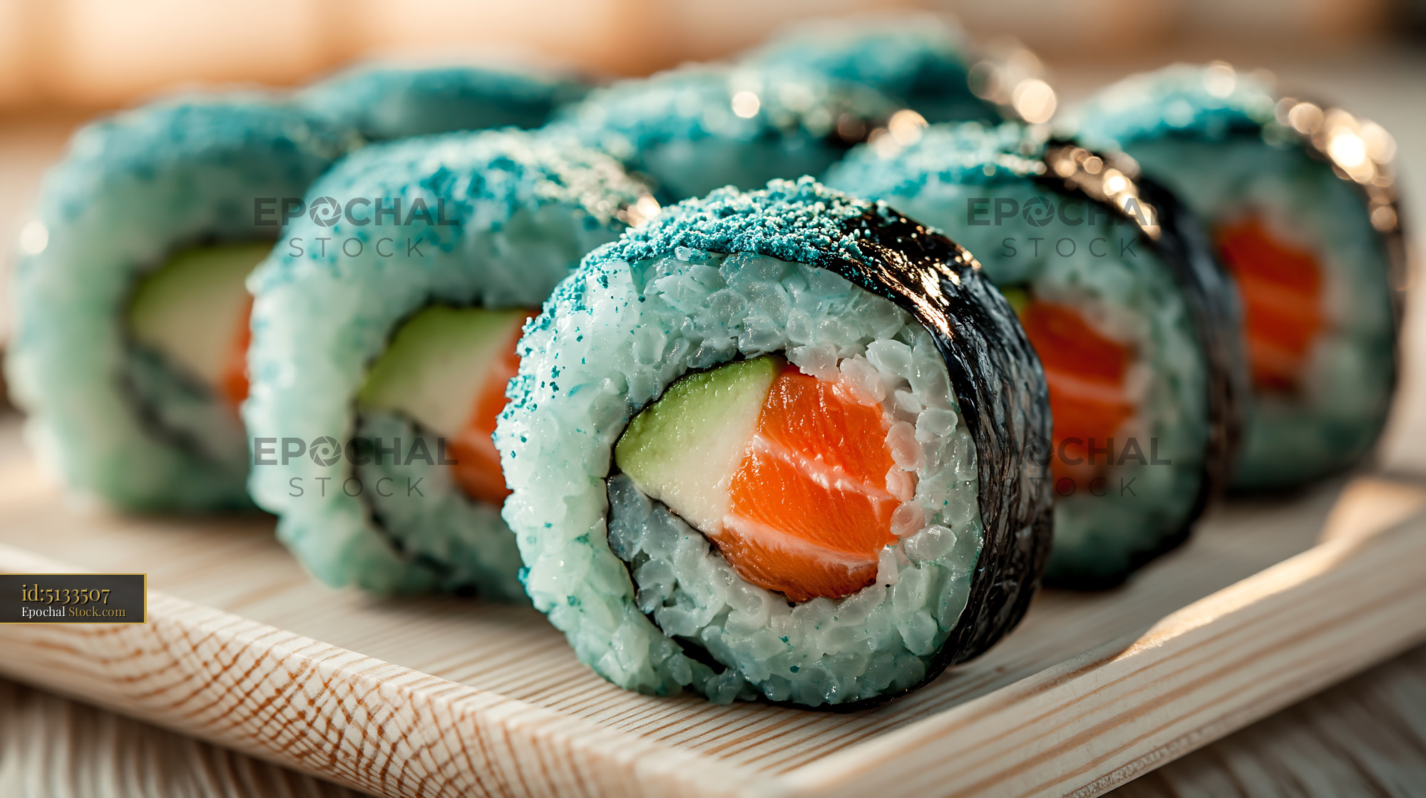 Fresh spirulina powder sushi rolls with salmon and avocado - stock photo