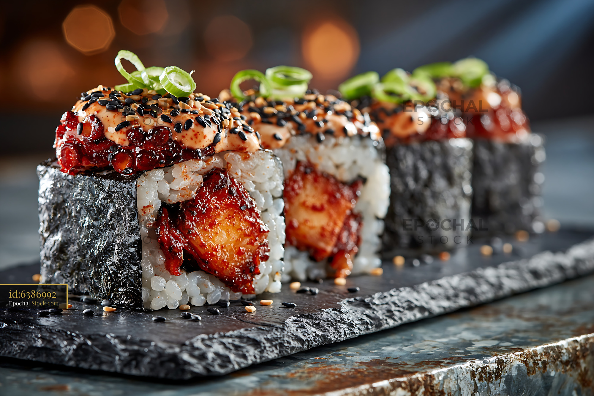 Gourmet kimchi fusion maki sushi with spicy sauce and sesame seeds - stock photo