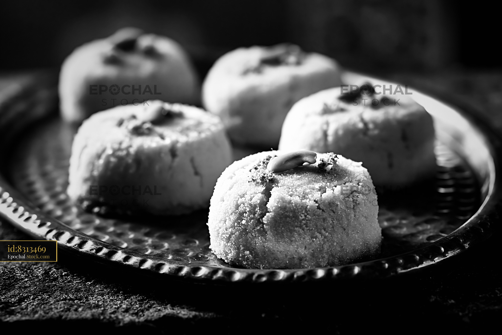 Traditional cardamom chickpea biscuits on a rustic metal tray - stock photo
