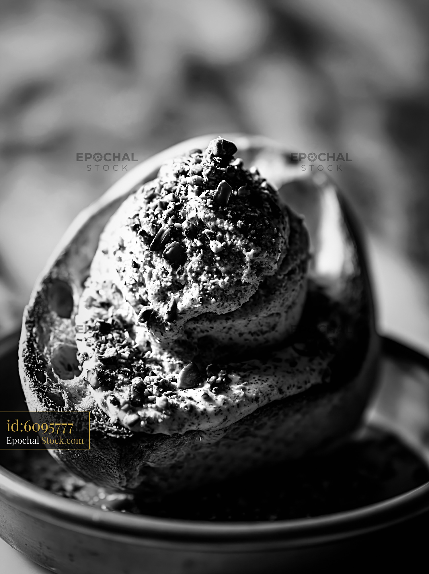 Gourmet fig leaf ice cream served in a rustic shell - stock photo