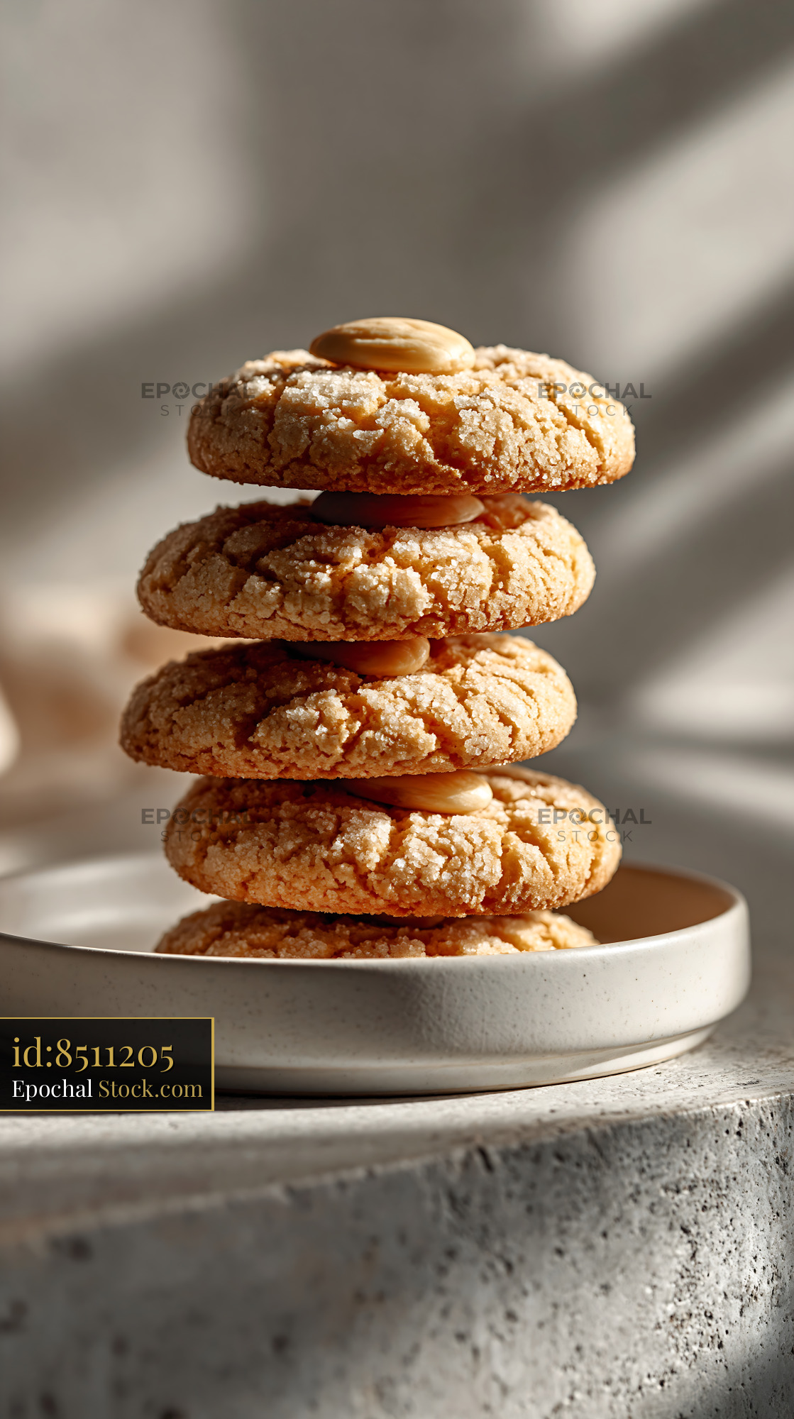 Stack of acibadem kurabiyesi biscuits with almonds in natural light - stock photo