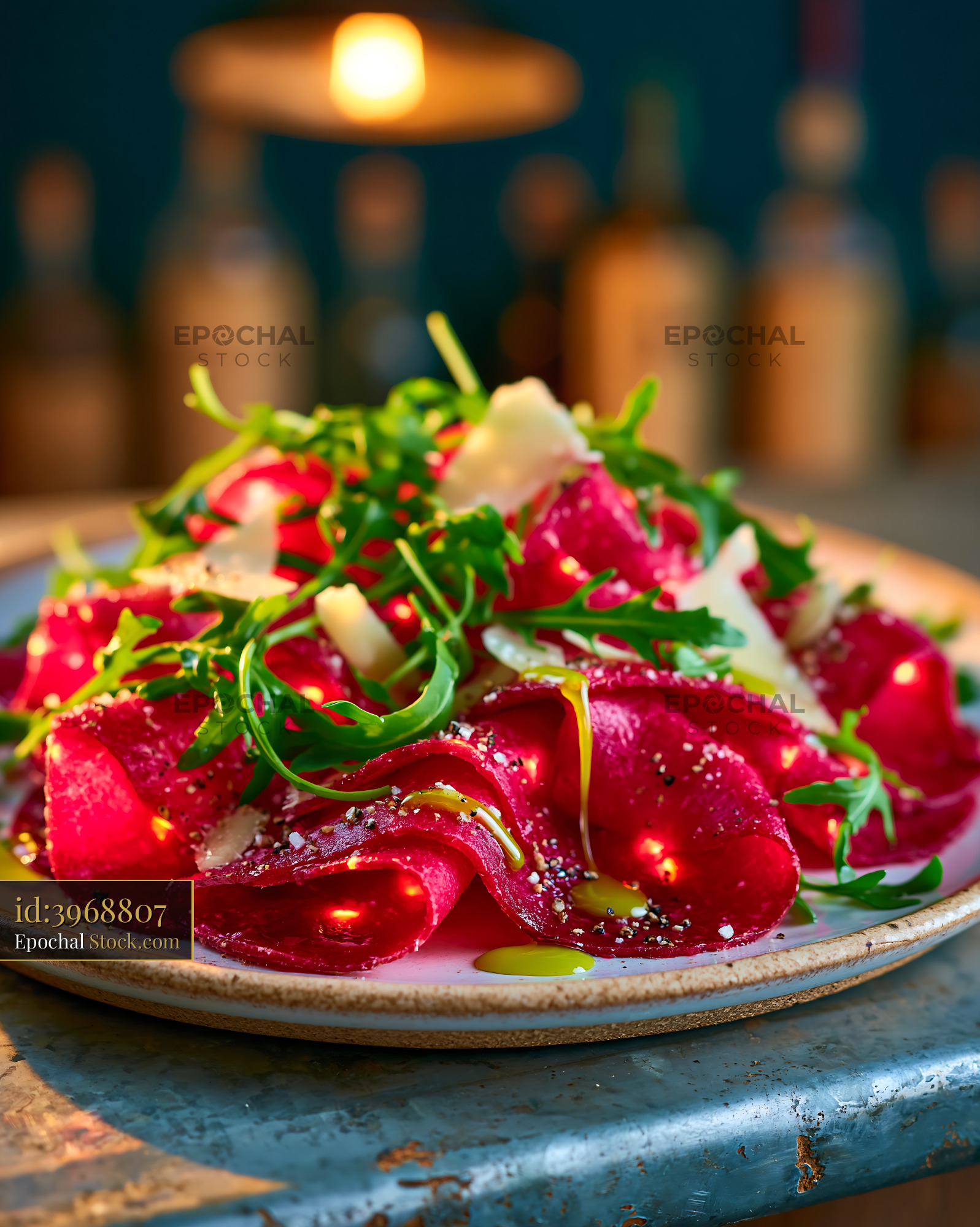 Gourmet bresaola della valtellina meat with arugula and parmesan - stock photo