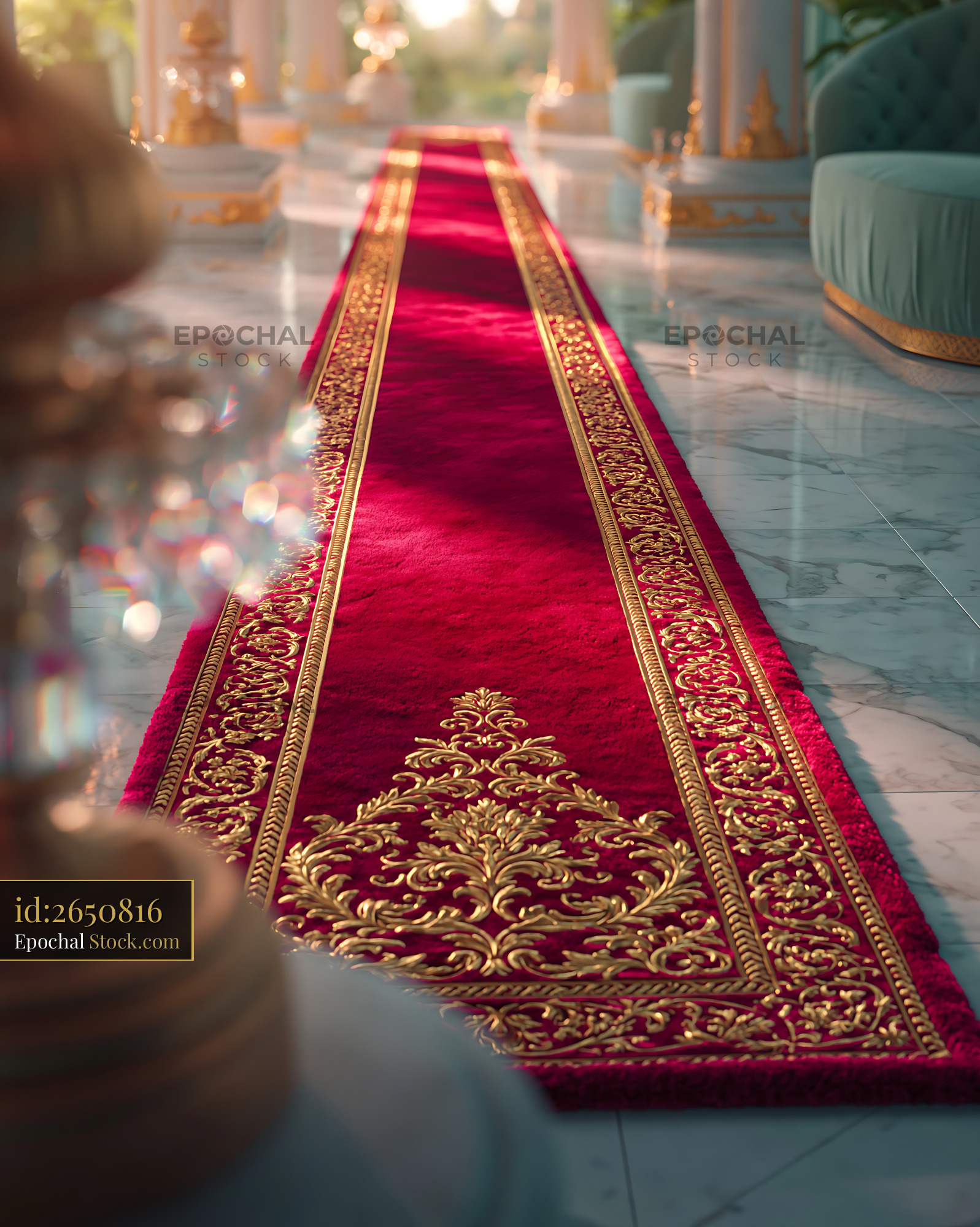 Luxurious red velvet carpet with gold embroidery in a grand marble hal - stock photo