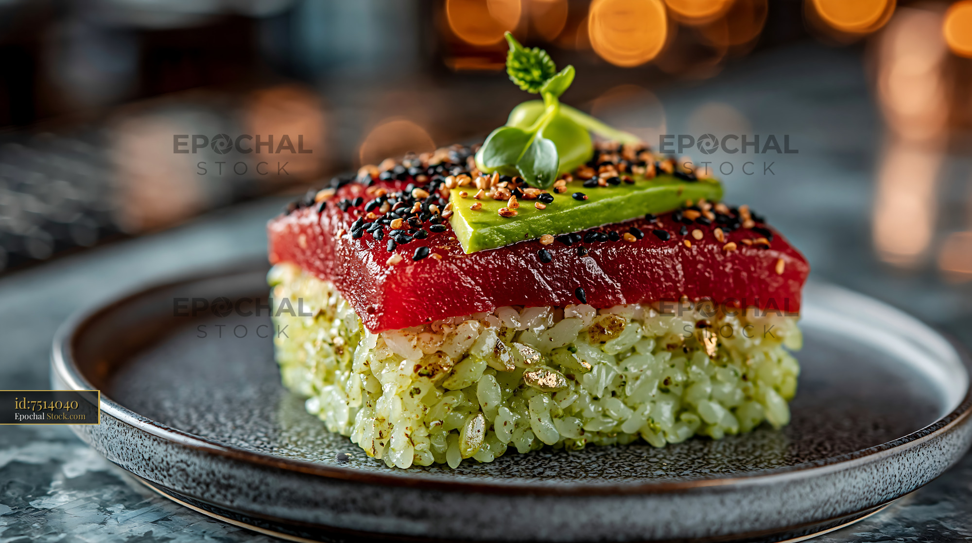 Gourmet tuna sushi with matcha infused rice and avocado garnish - stock photo