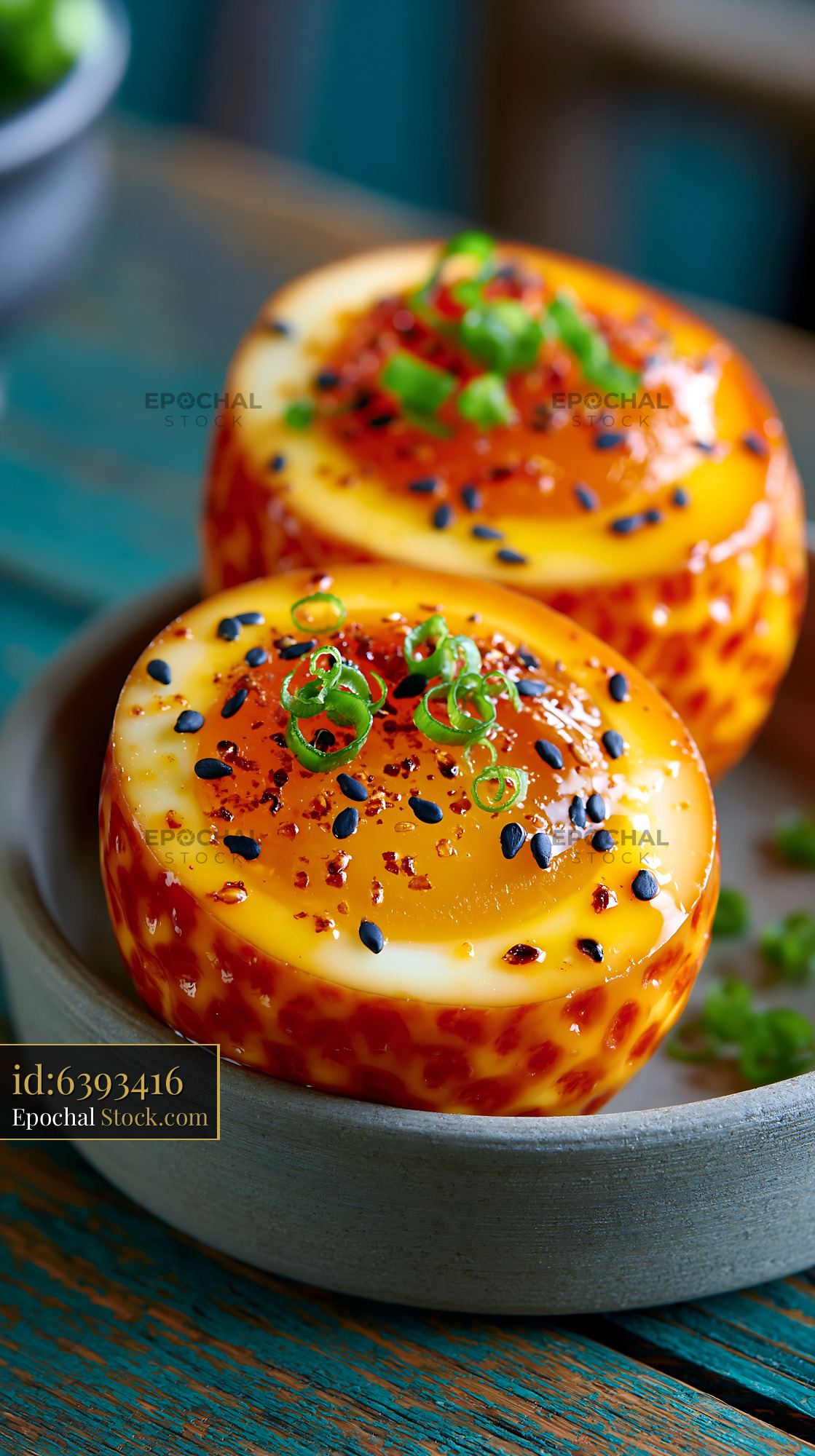 Soft-boiled ajitsuke tamago eggs with sesame and spring onions - stock photo
