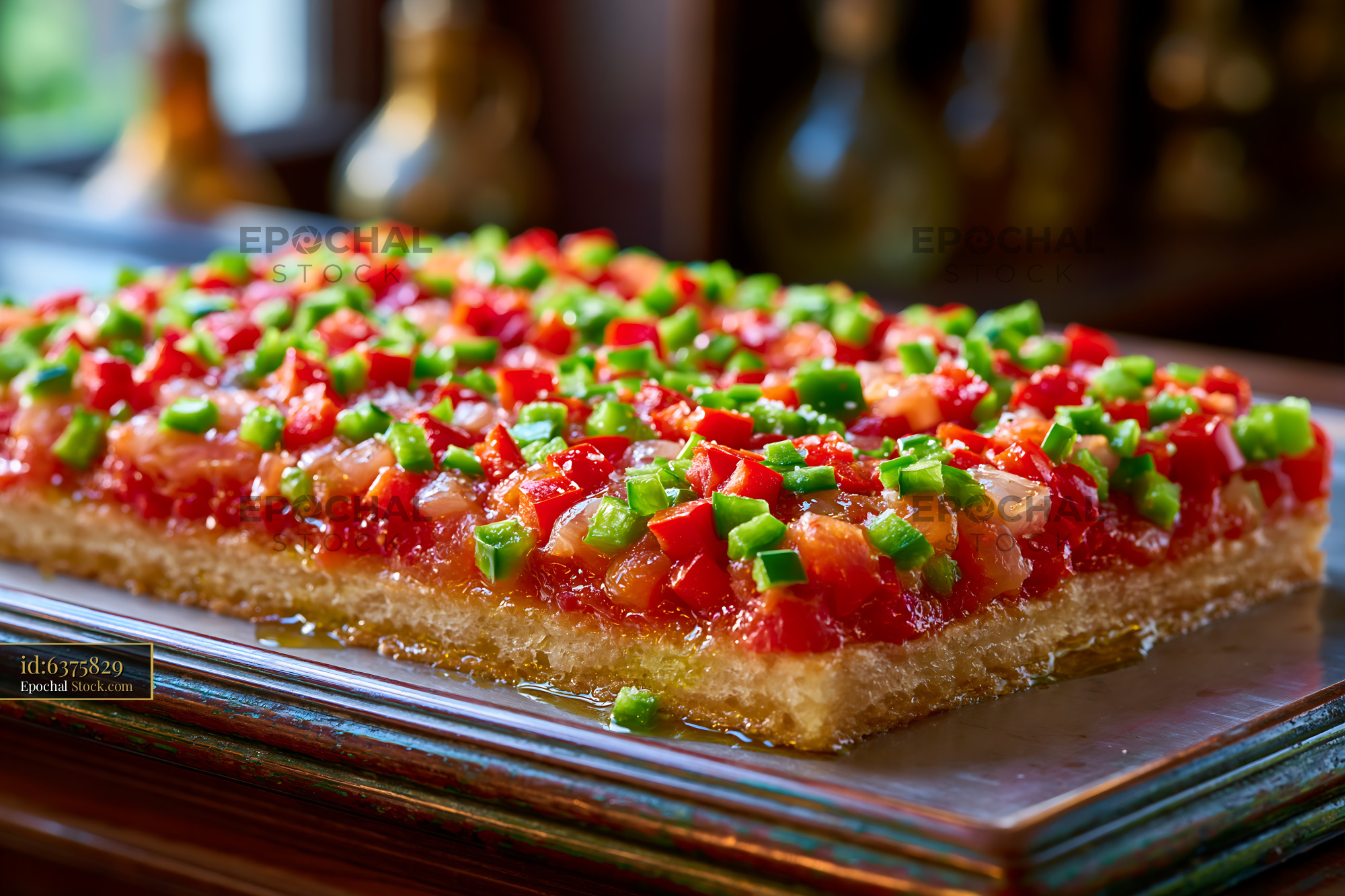Traditional coca de tremp pizza topped with fresh diced vegetables - stock photo