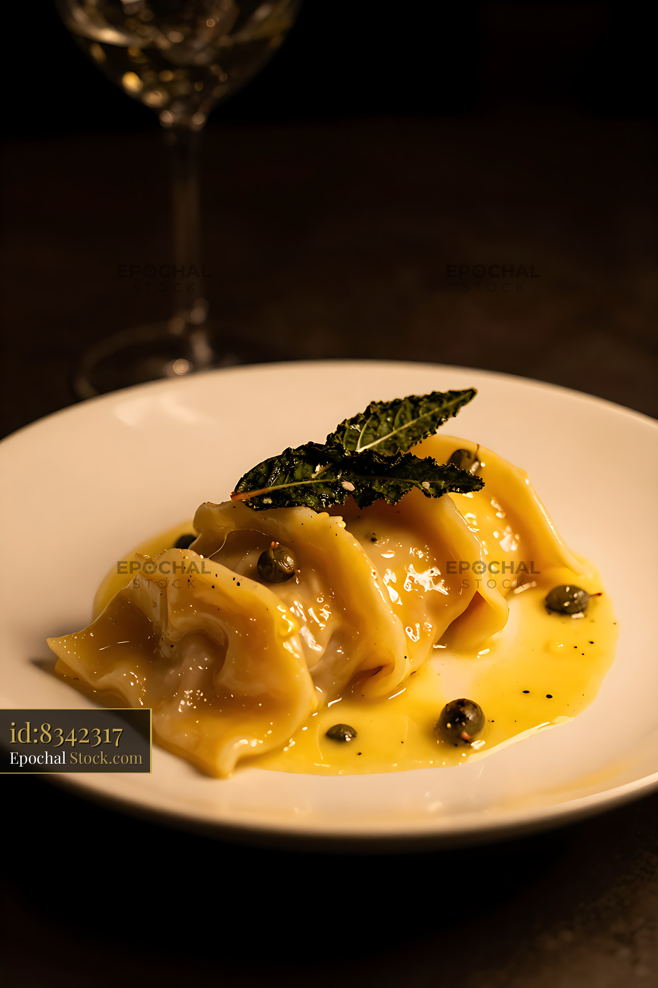 Saltimbocca alla Romana with sage and capers in a gourmet setting - stock photo