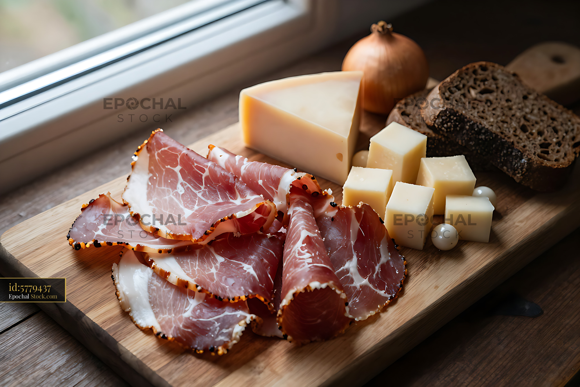 Traditional Schwarzwaelder Schinken Brettljause with cheese and bread - stock photo