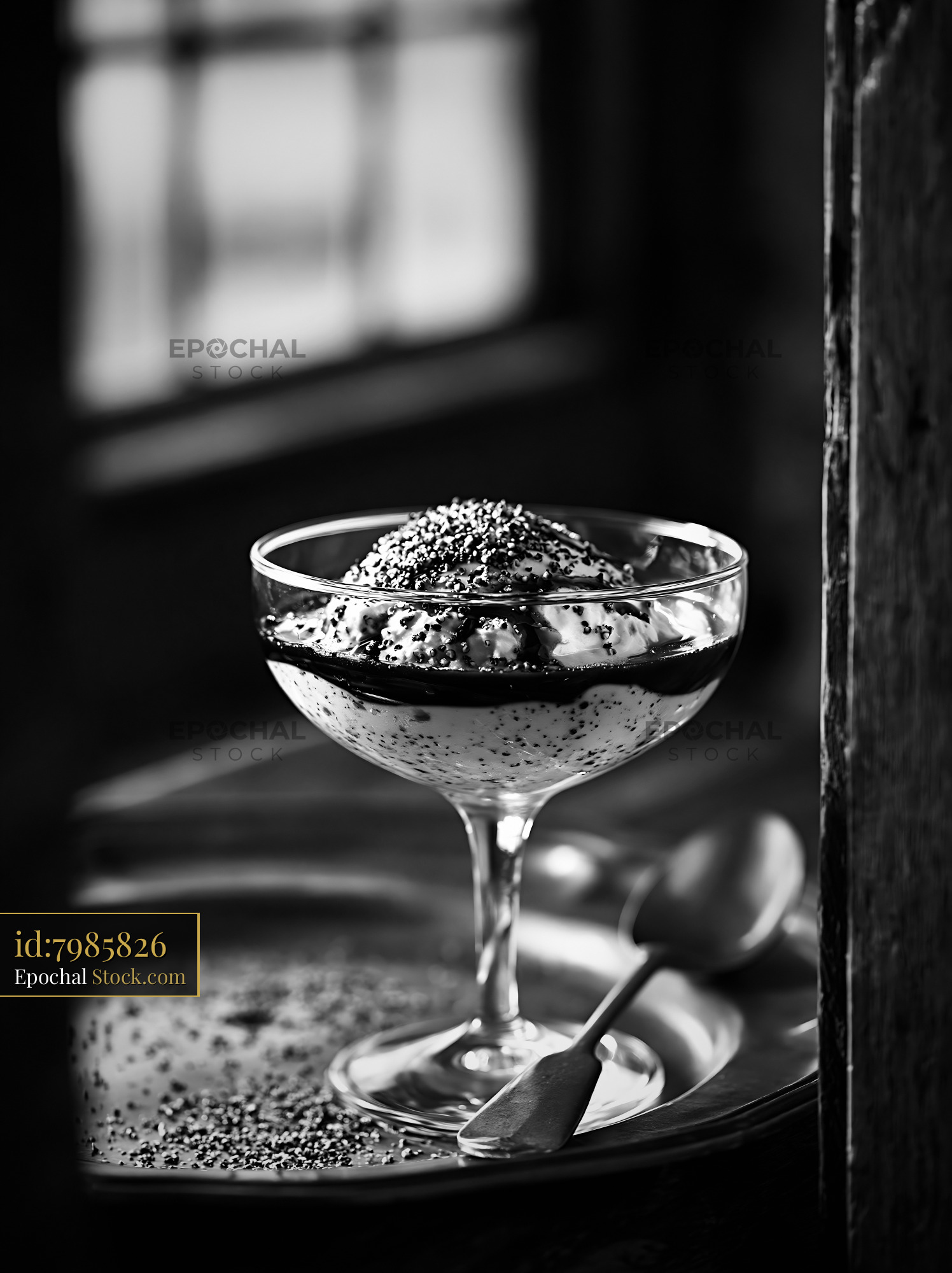 Gourmet balsamic ice cream dessert in a coupe glass on a rustic tray - stock photo