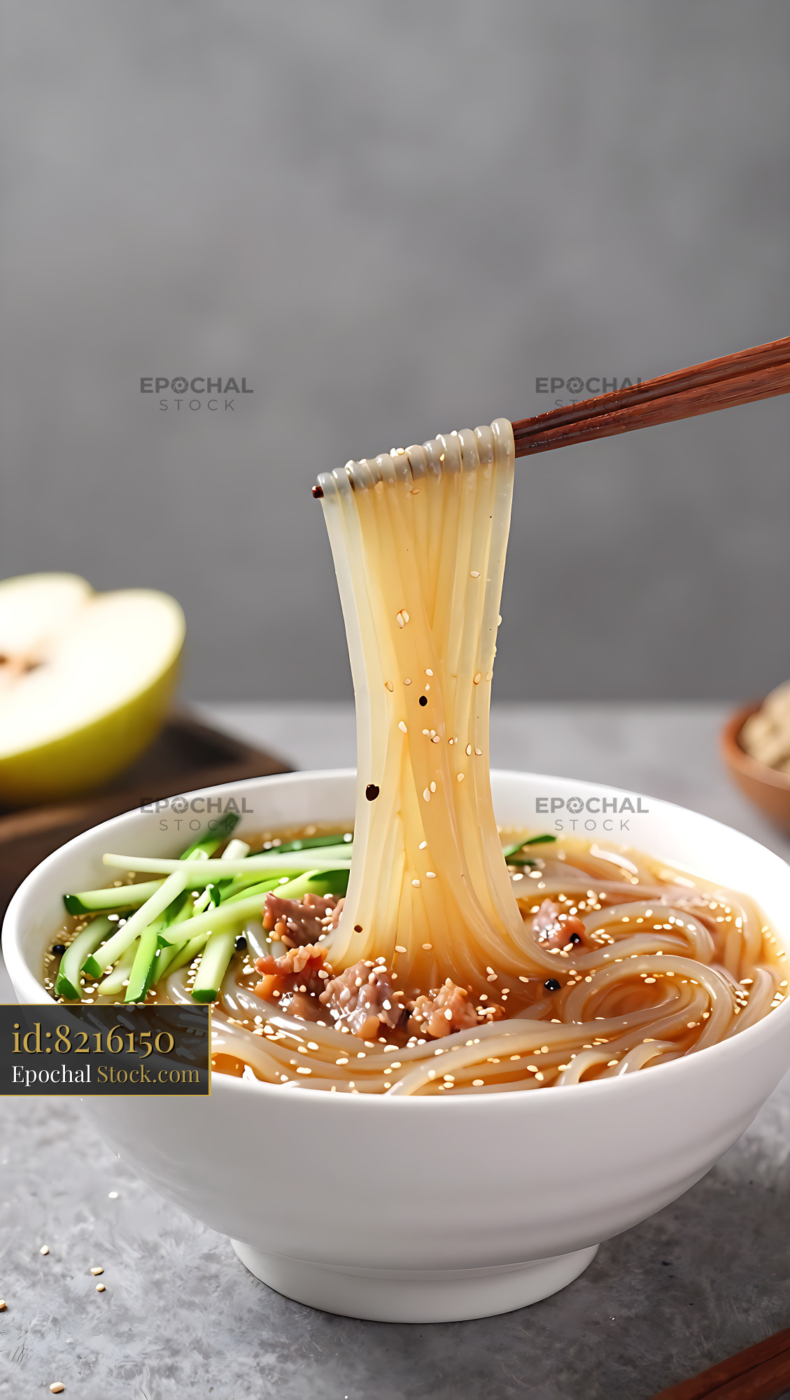 Bowl of refreshing Dongbei Lengmian with cucumber and sesame seeds - stock photo