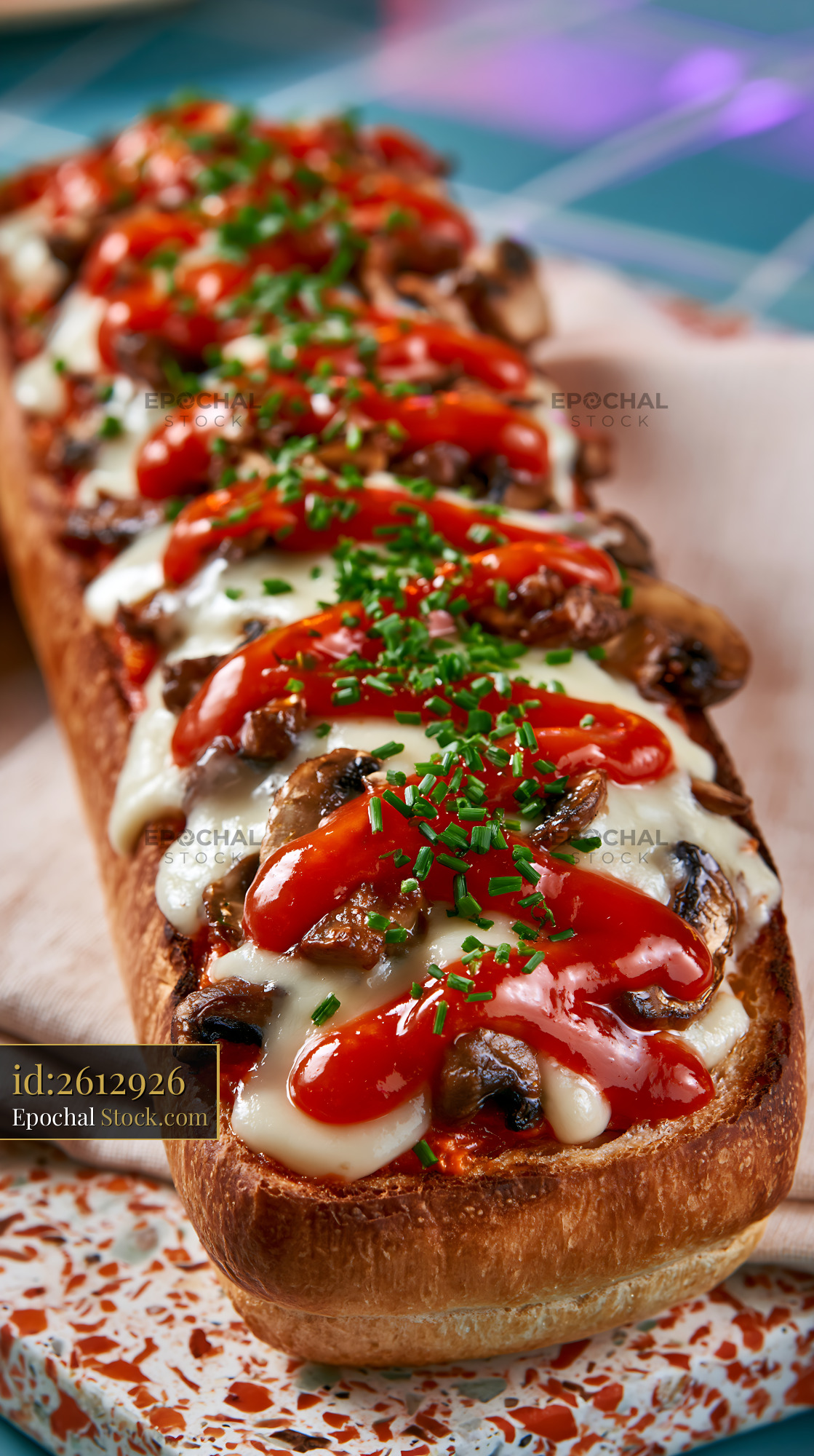 Zapiekanka pizza with melted cheese mushrooms and ketchup on baguette - stock photo