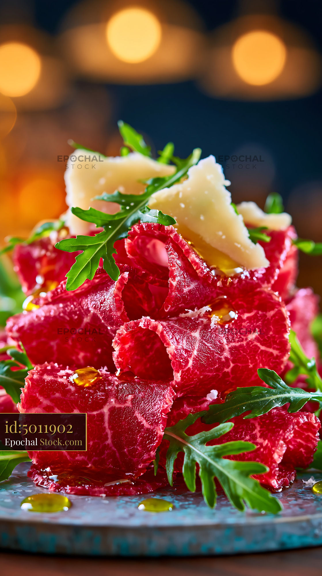 Cotechino modena meat appetizer with arugula and parmesan cheese - stock photo