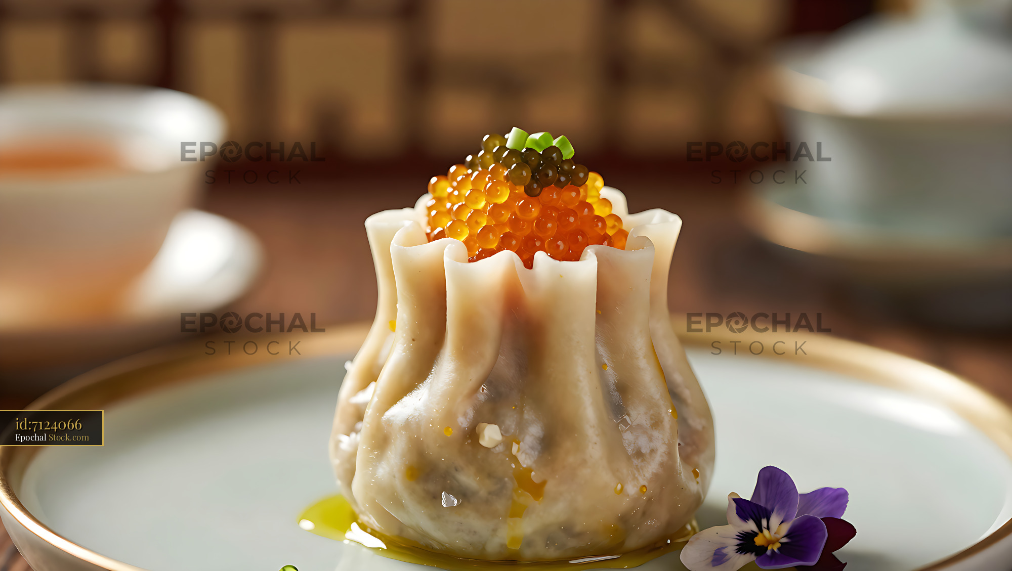 Gourmet wagyu shumai dumpling topped with a luxury caviar crown - stock photo