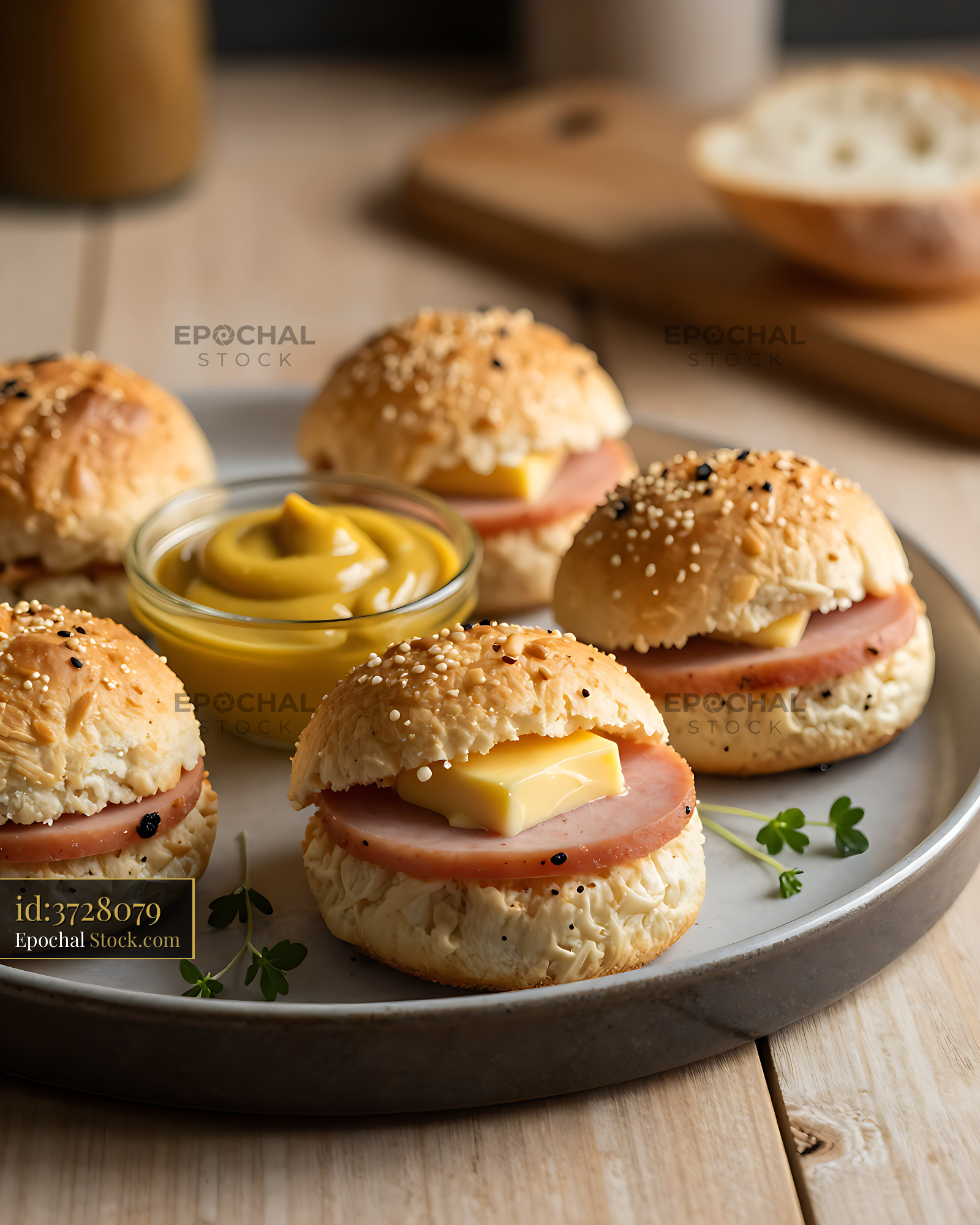Traditional Smithfield ham biscuits with butter and mustard on a plate - stock photo