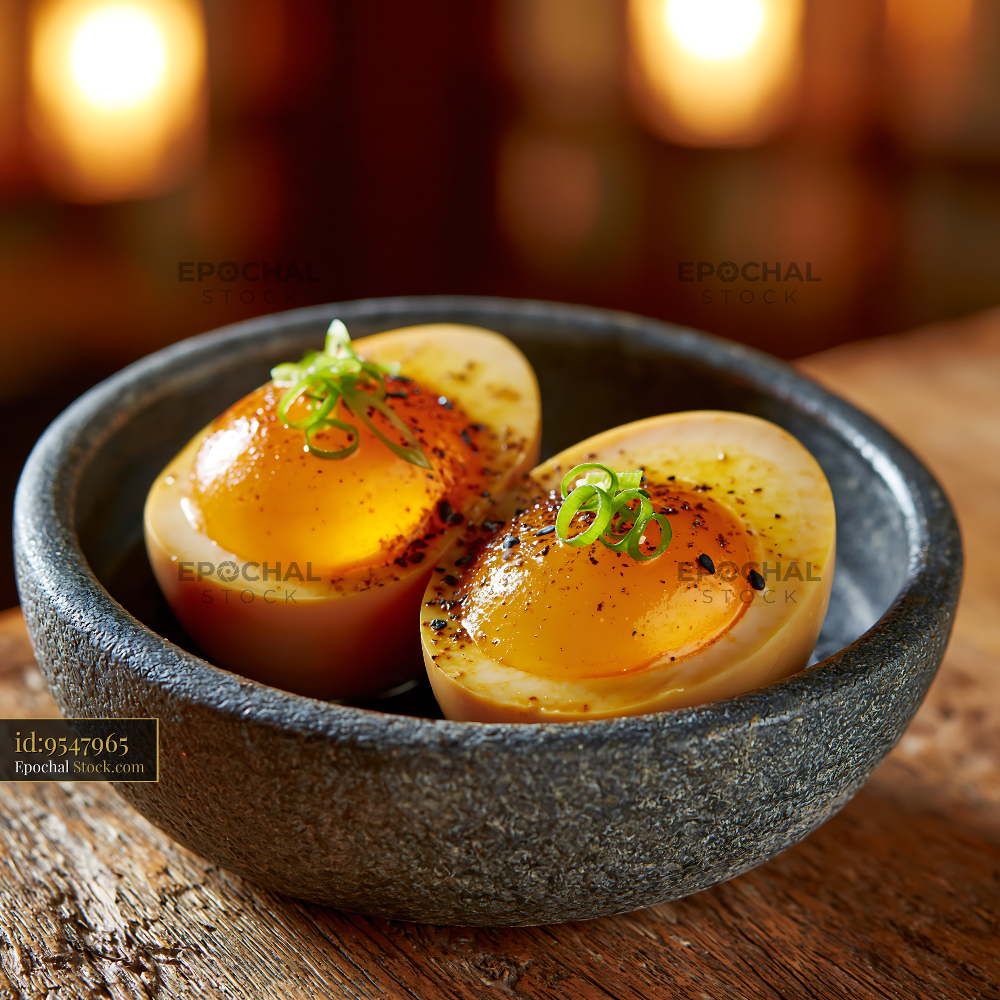 Ajitsuke tamago marinated eggs with jammy yolks in a stone bowl - stock photo