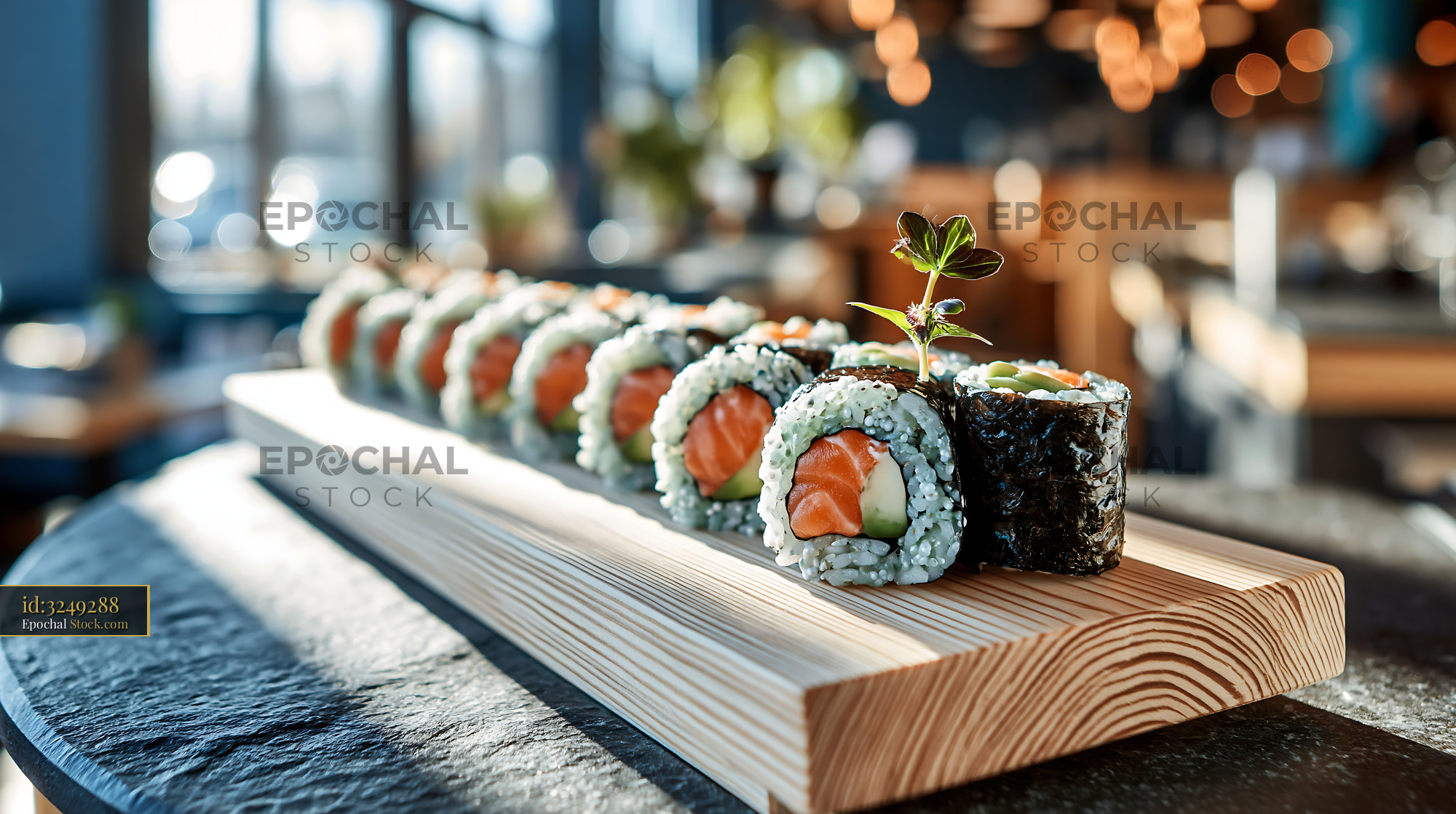 Salmon and avocado maki rolls with matcha infused rice - stock photo