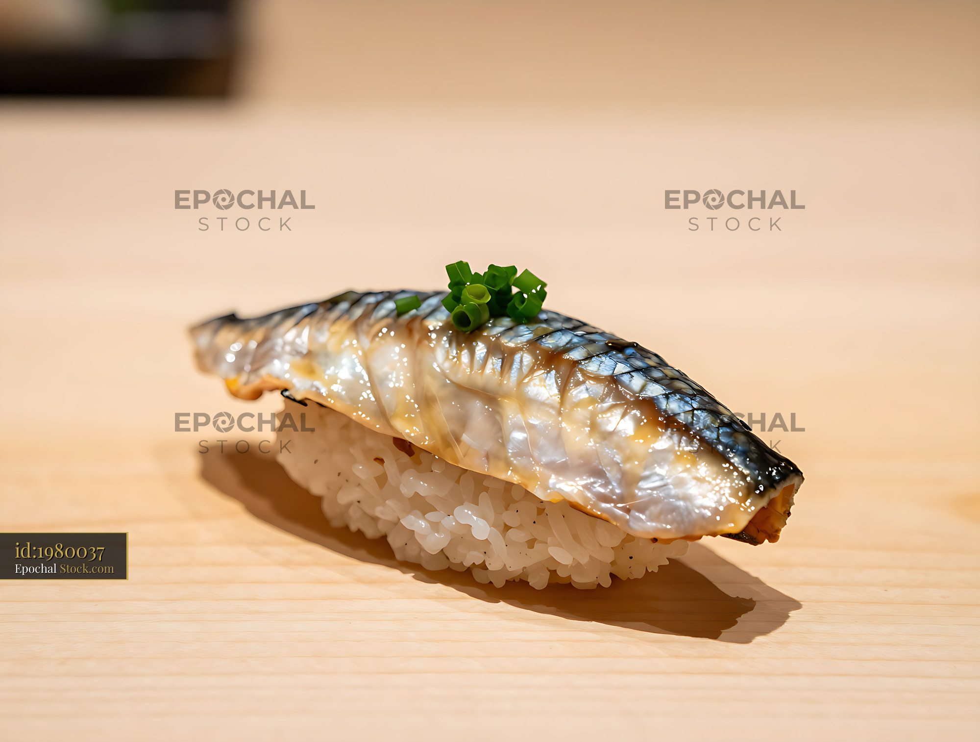 Iwashi Nigiri sushi topped with chives on wooden counter - stock photo
