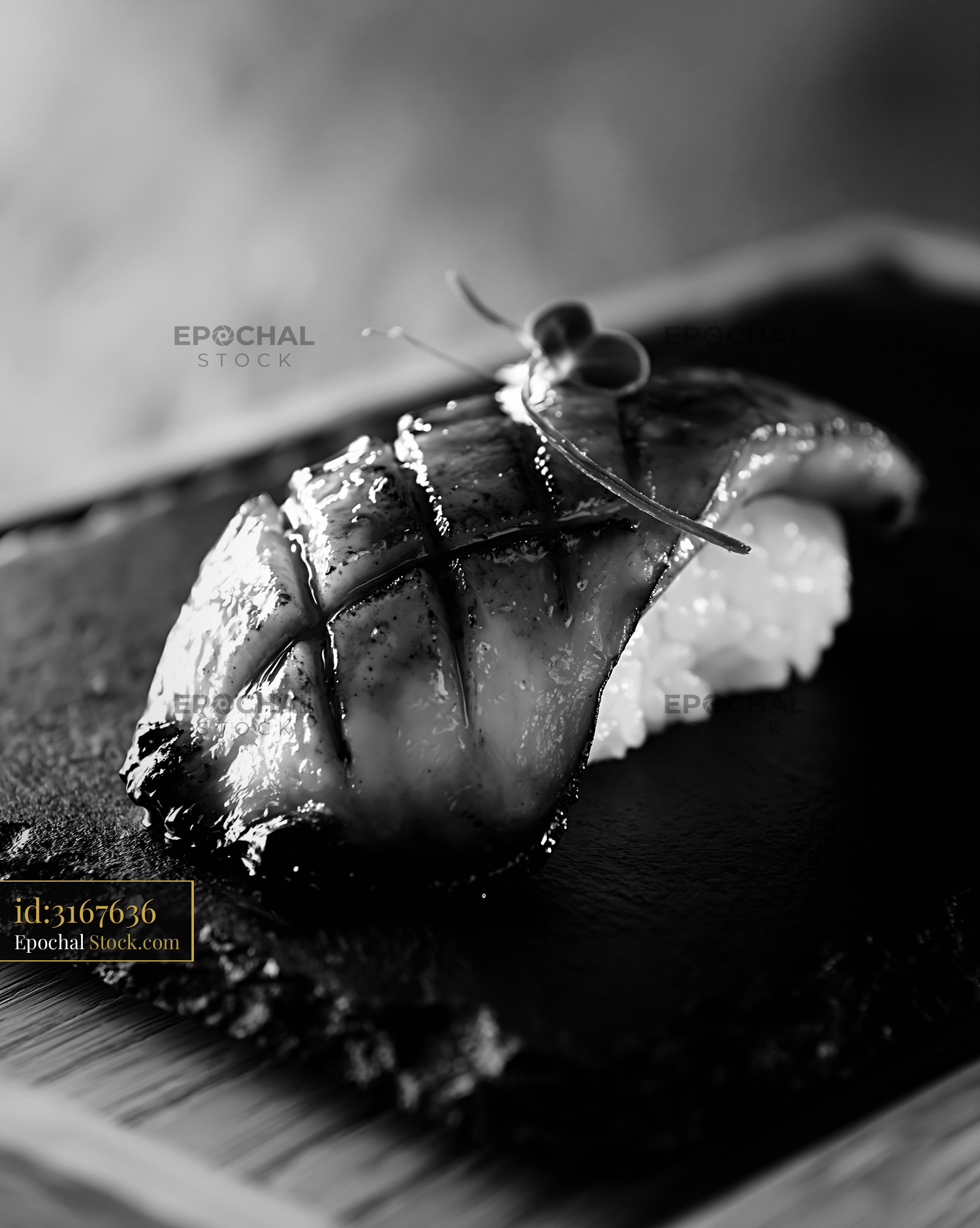 King oyster mushroom sushi nigiri on a dark textured slate plate - stock photo