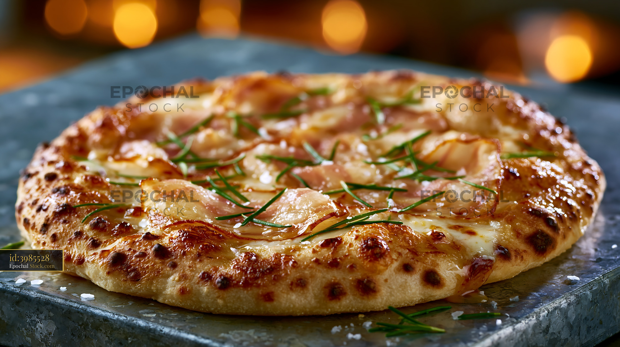 Lardo di colonnata pizza with rosemary and sea salt on rustic stone - stock photo