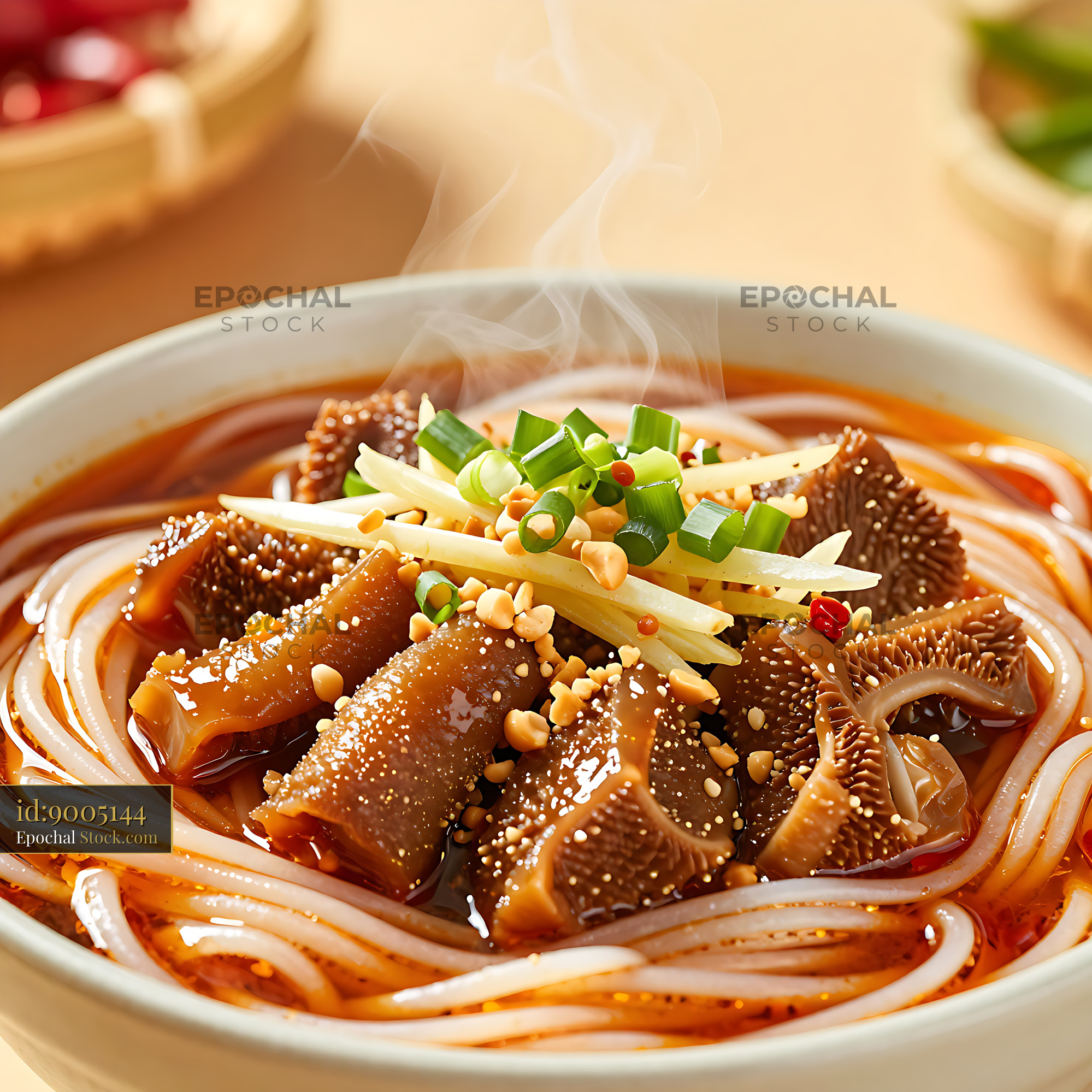 Steaming bowl of spicy Changde Niurou Mifen with beef tripe and ginger - stock photo