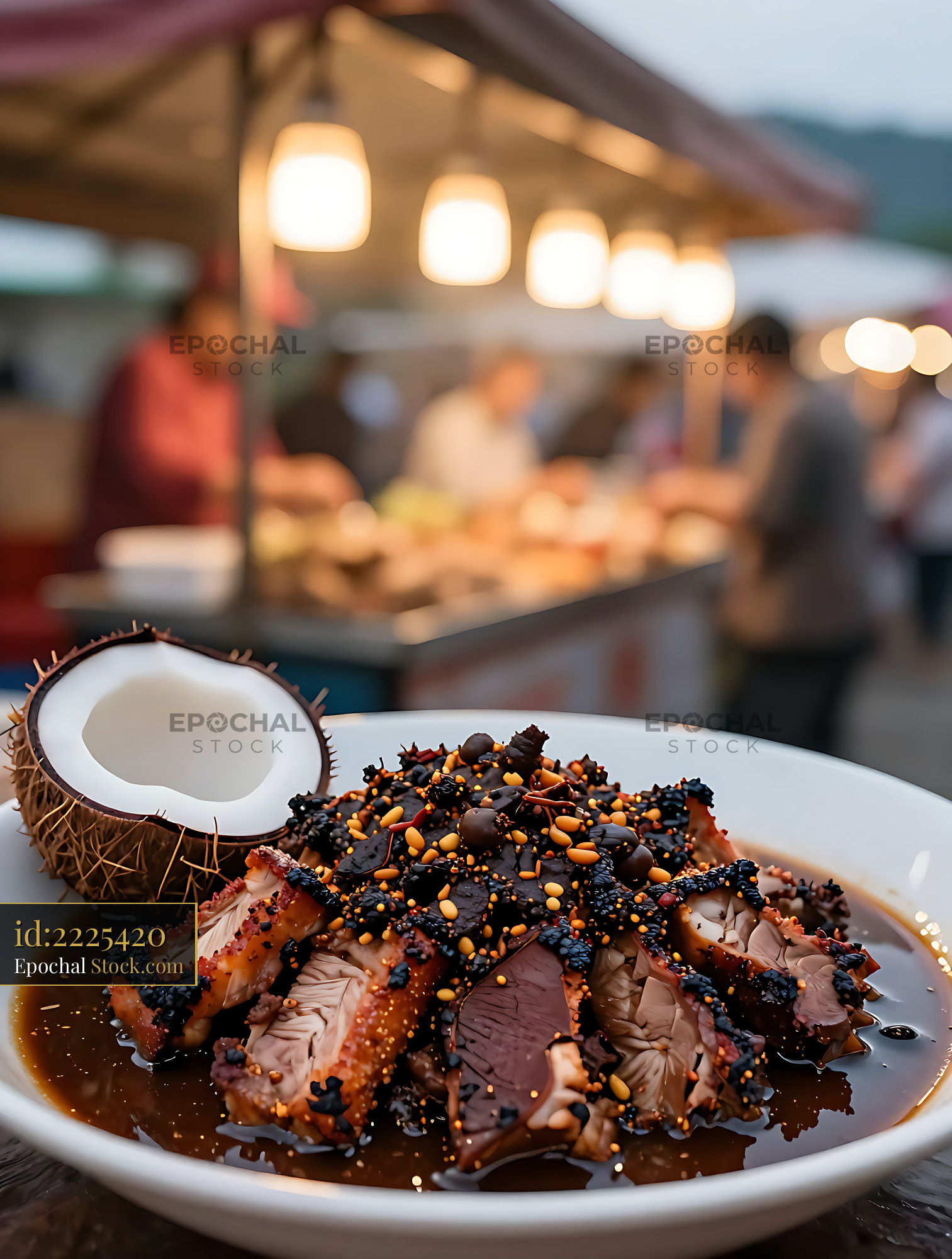 Traditional North Sumatra Saksang pork dish at a vibrant night market - stock photo
