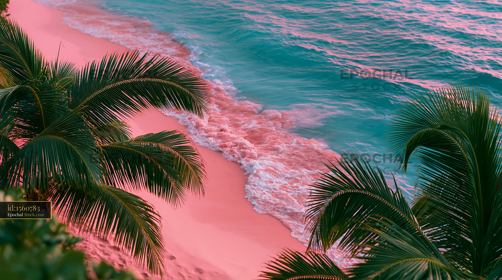 Tropical beach with pink sand and turquoise water framed by palm leave - stock photo