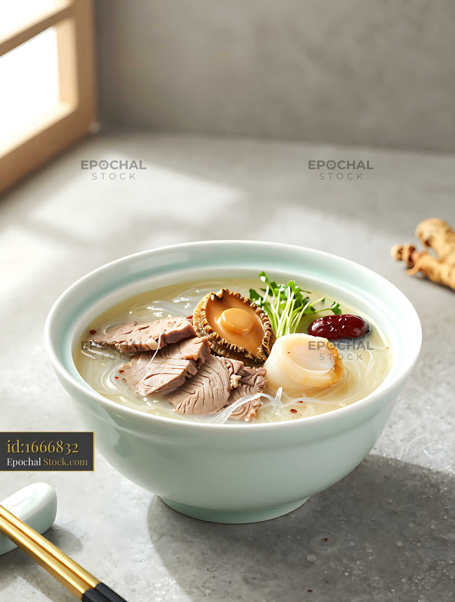 Eight-Treasure Beef Soup with Bird's Nest served in a ceramic bowl - stock photo