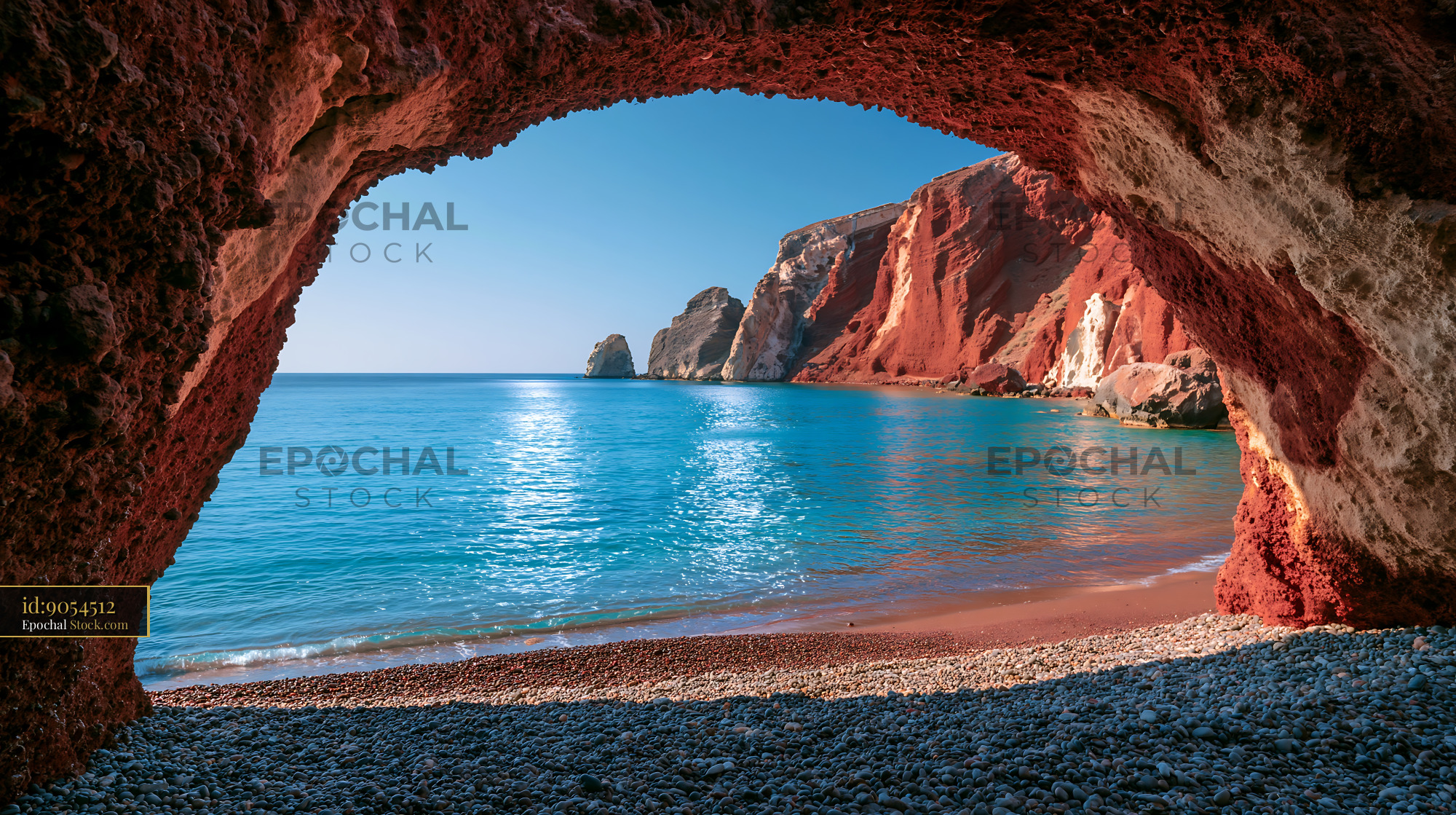Red volcanic cave overlooking turquoise sea at Ribeira Grande Azores - stock photo