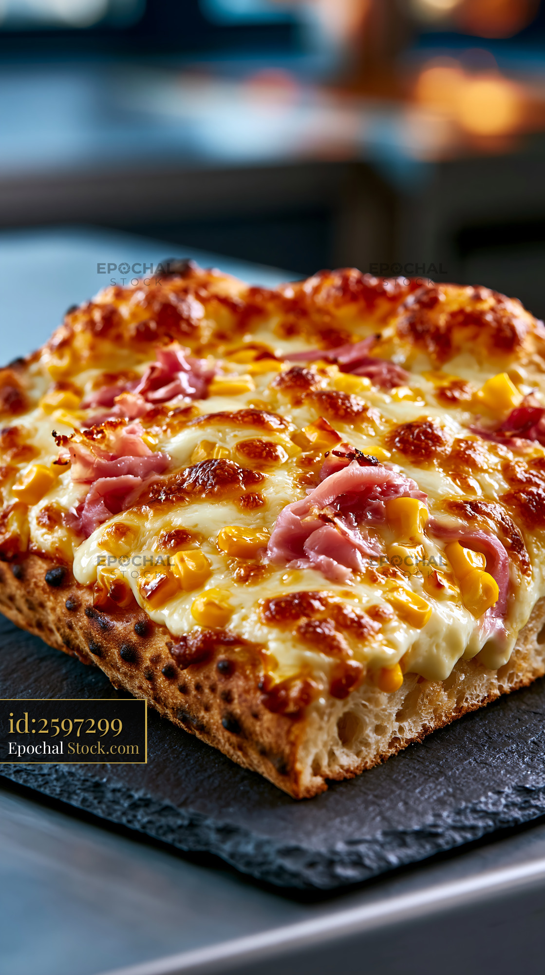 Gourmet panna mais pizza slice with cooked ham and sweet corn - stock photo