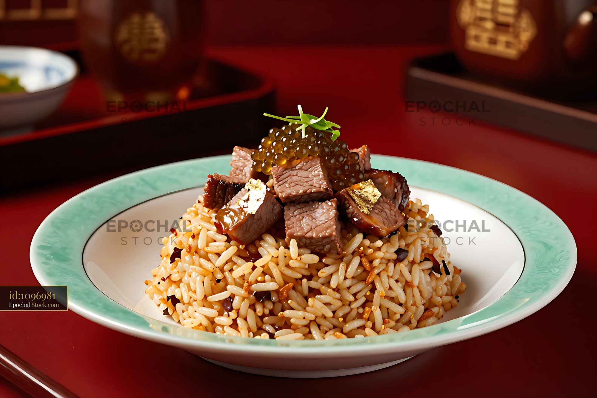 A5 wagyu fried rice with caviar and gold leaf on a ceramic plate - stock photo