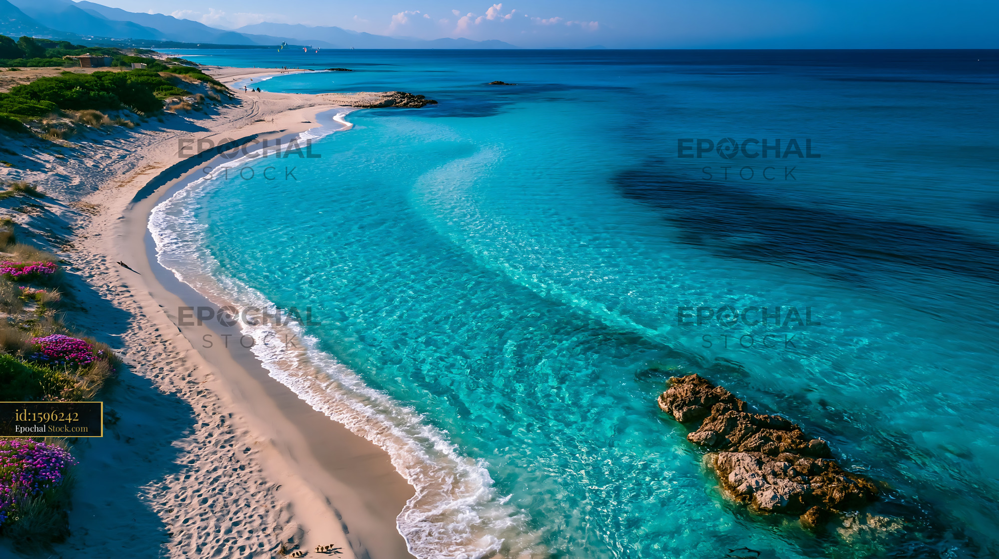 Aerial view of turquoise water and white sand at La Pelosa beach - stock photo