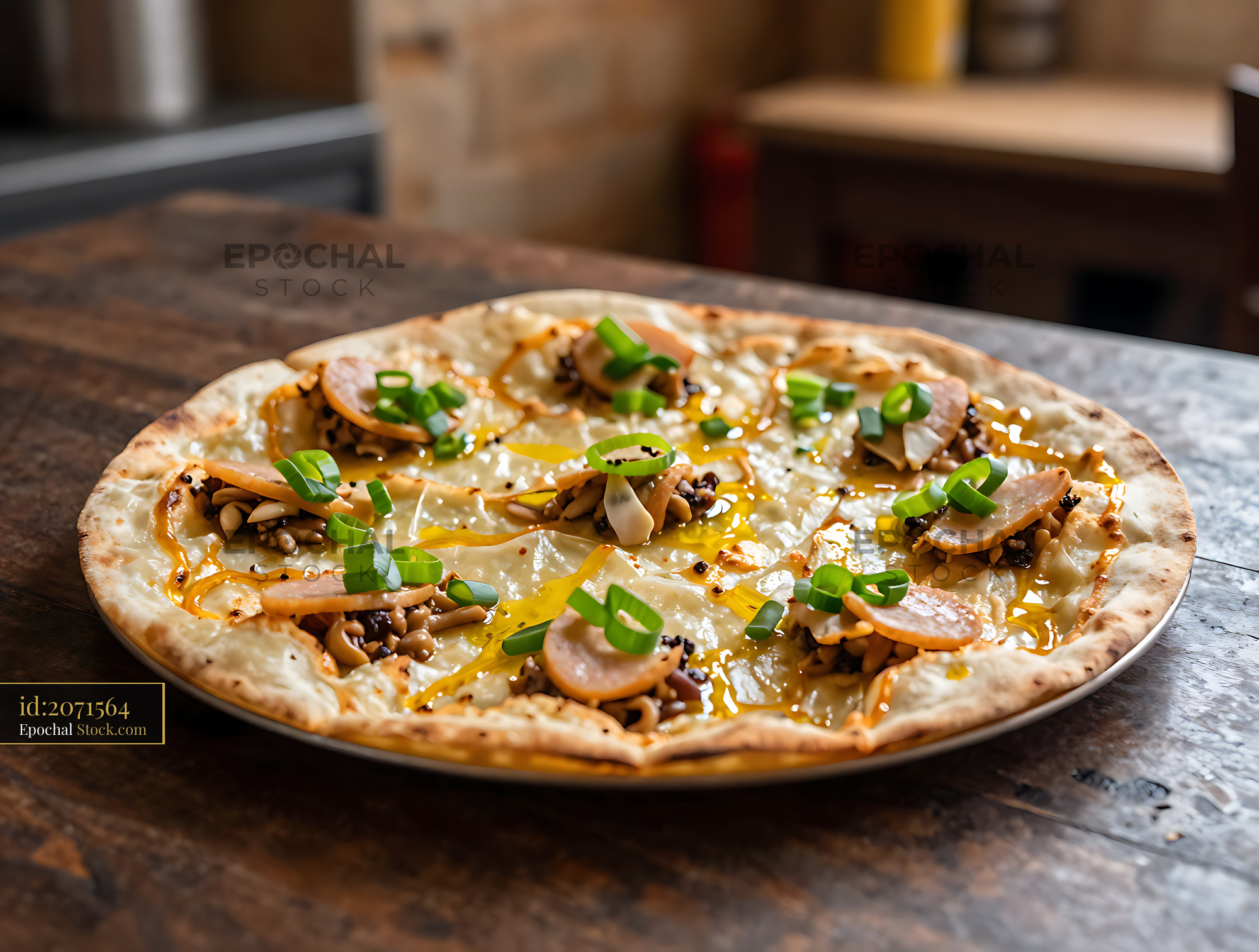 Vietnamese Banh Trang Nuong pizza with spring onions and mushrooms - stock photo