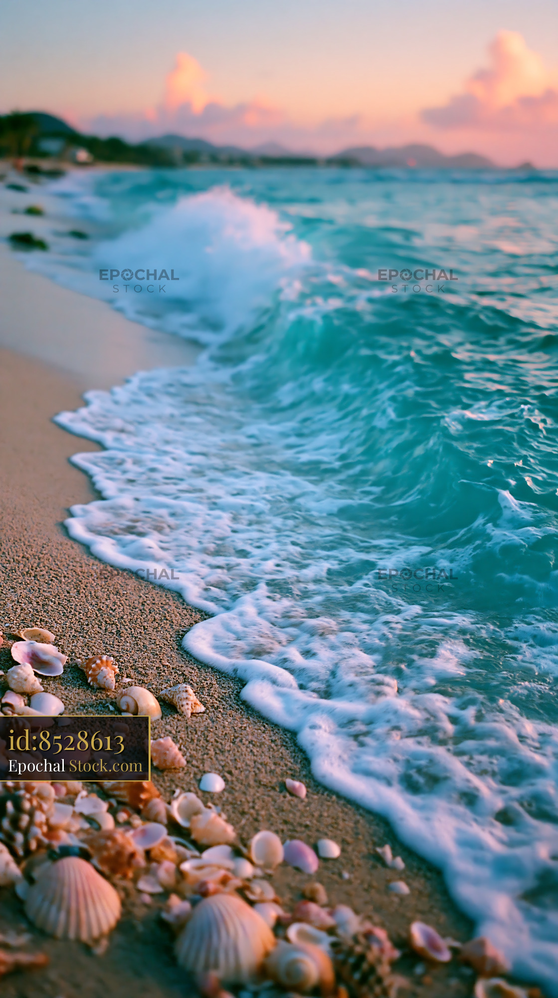Turquoise ocean waves crashing over seashells on a sandy beach at suns - stock photo